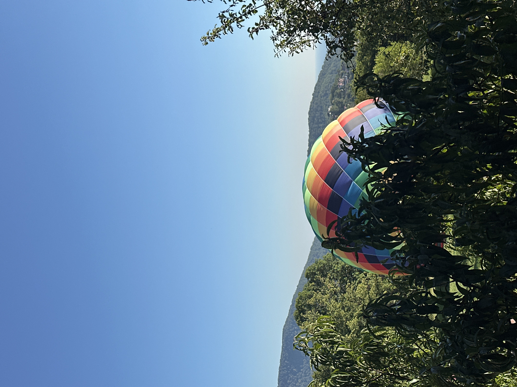Hot air balloon on the ground, rustic surroundings in Progress, Russia