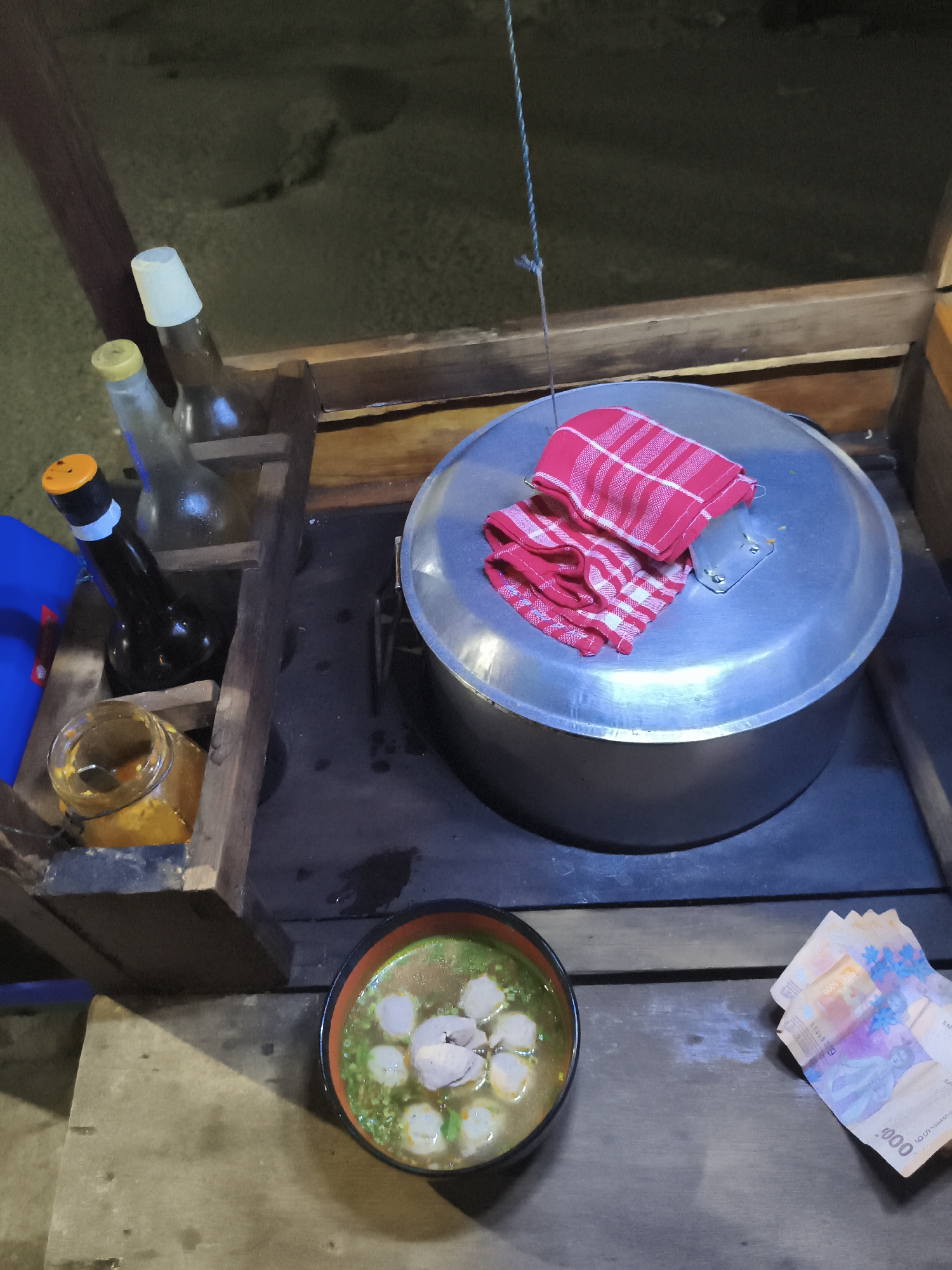Night bakso vendor serves meatball soup in Depok, Indonesia