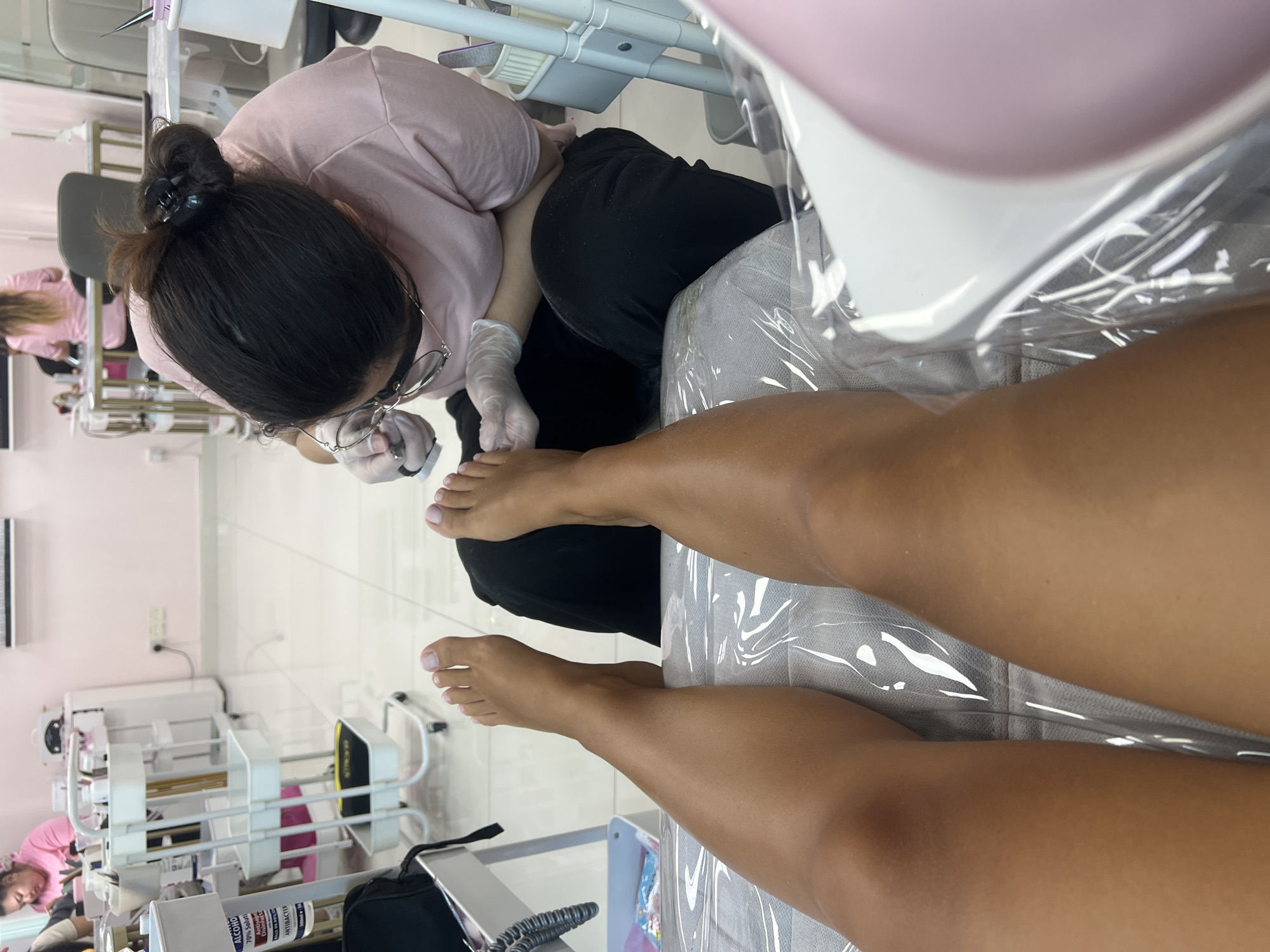 Woman provides pedicure service at Business Bay salon
