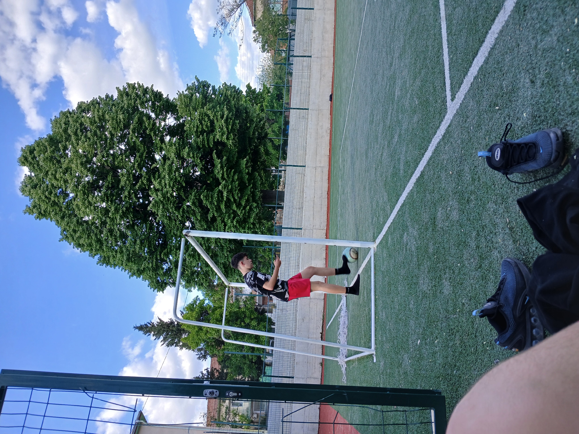 Everyday moments captured in Bulgarian village: soccer, flowers, greetings