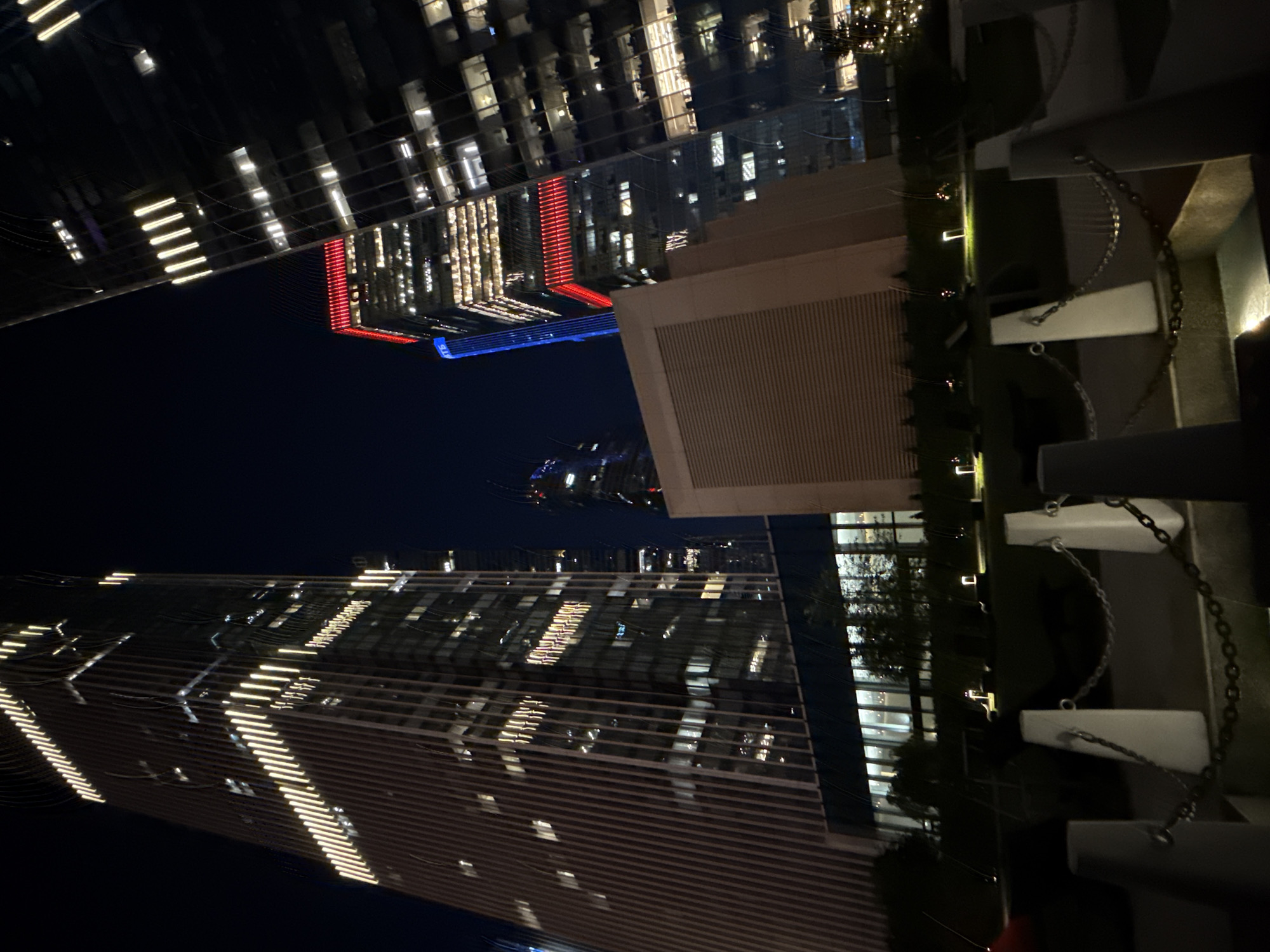 Moscow City towers glow at night from multiple angles