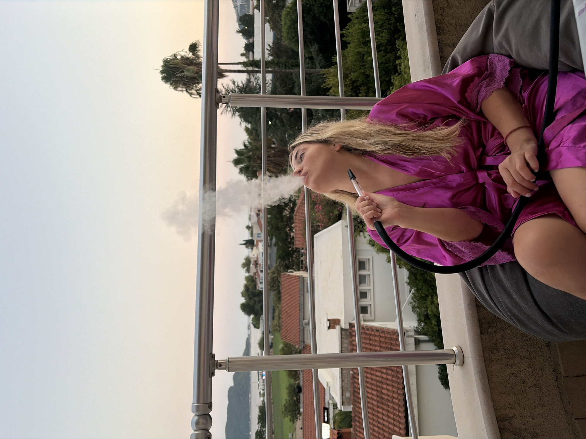 Hookah session on a Budva balcony, overlooking the water