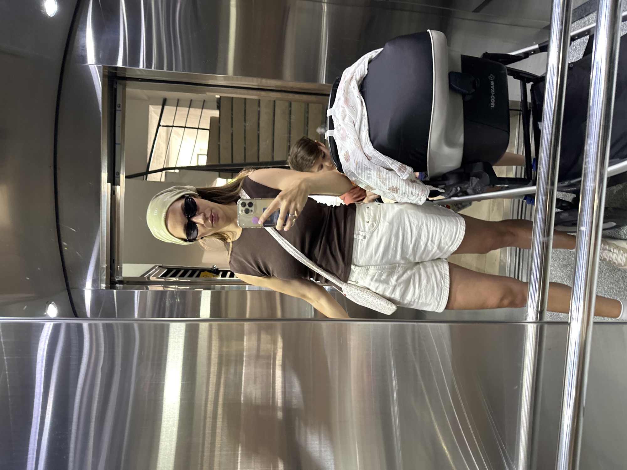 Woman Takes Selfie in Mirrored Elevator in Fethiye