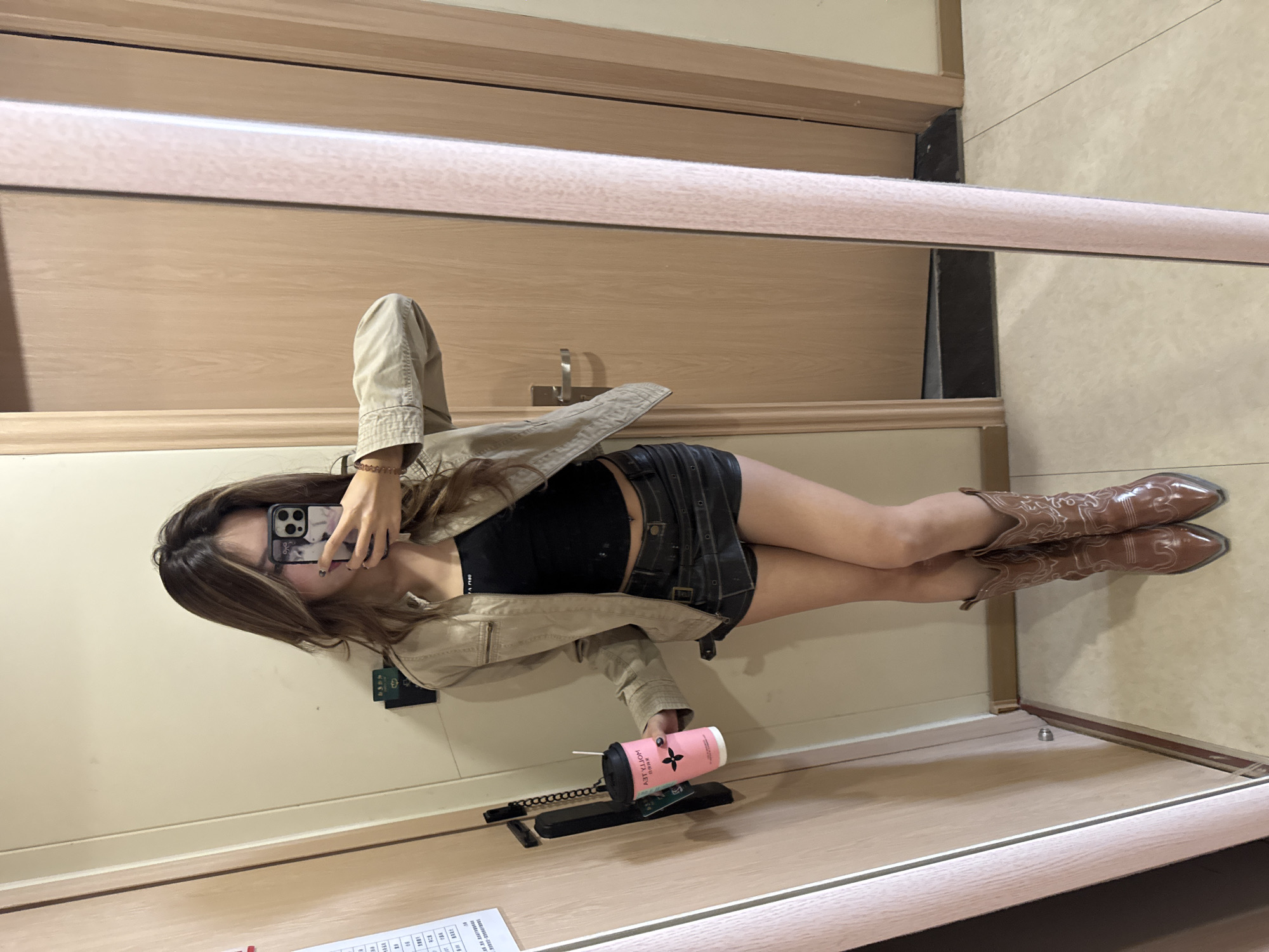 Women Take Mirror Selfies in Dunhuang Indoor Location