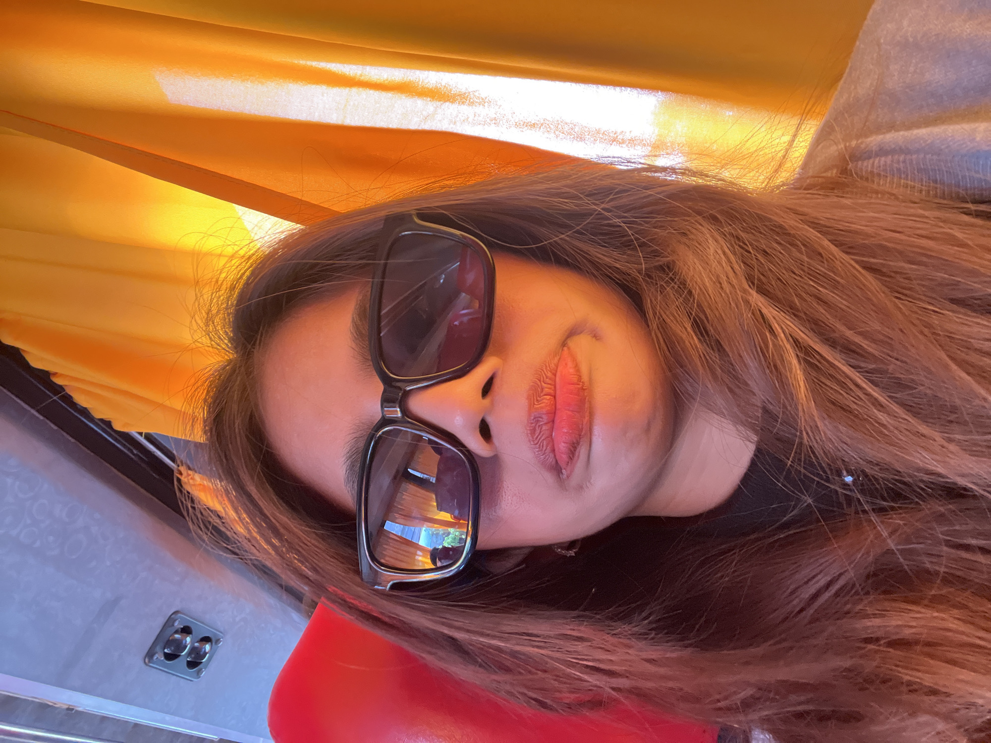 Woman takes playful selfies on public transport in Tagum