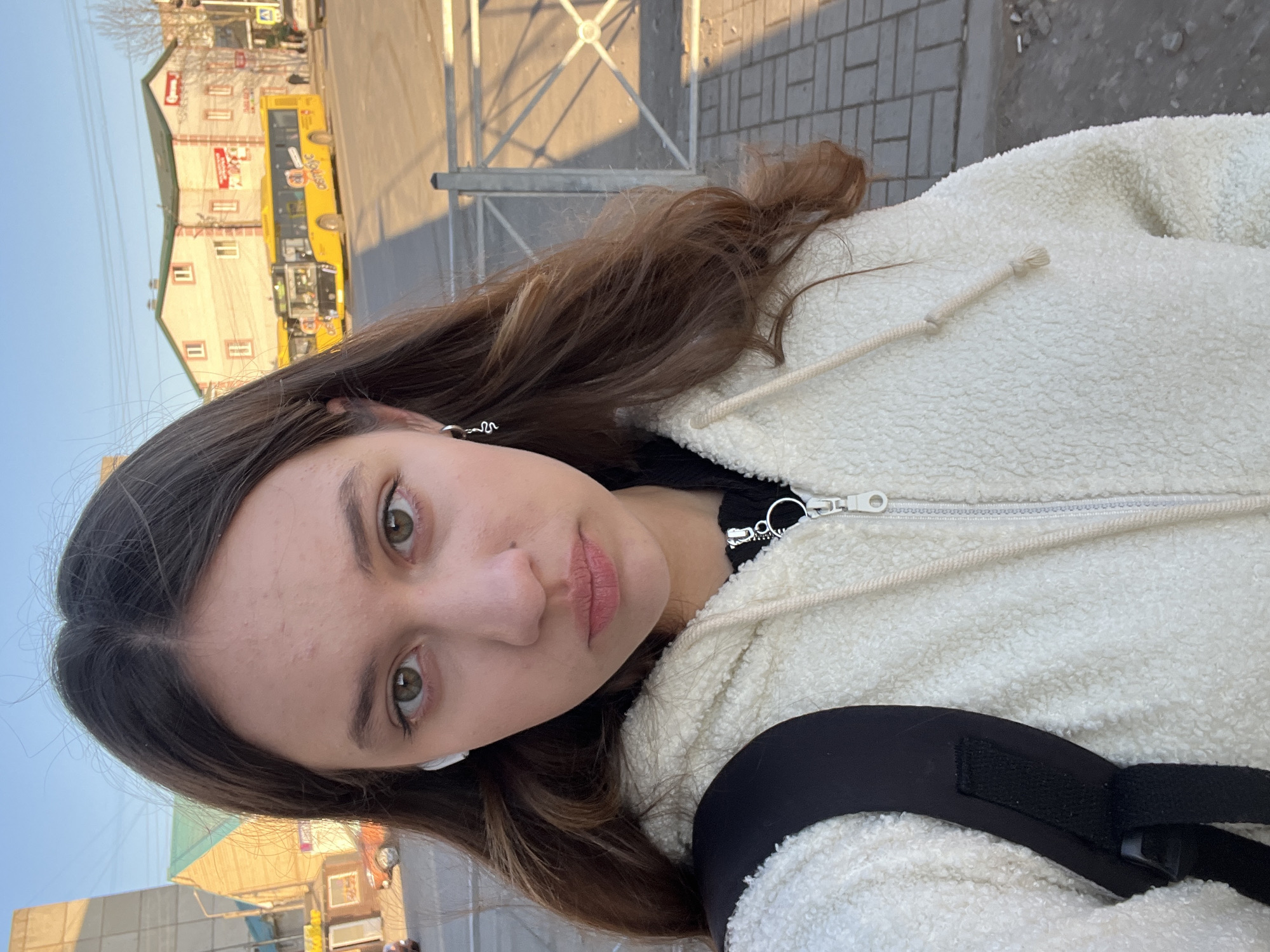 Woman takes outdoor selfie in Ново-Никольское, Russia
