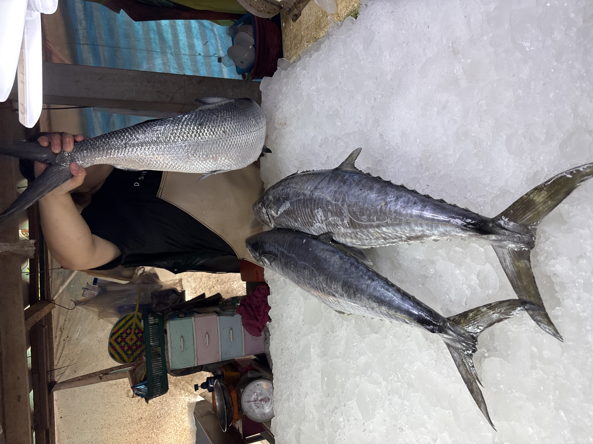 Morning market activity documented in Baan Plai Laem Thailand
