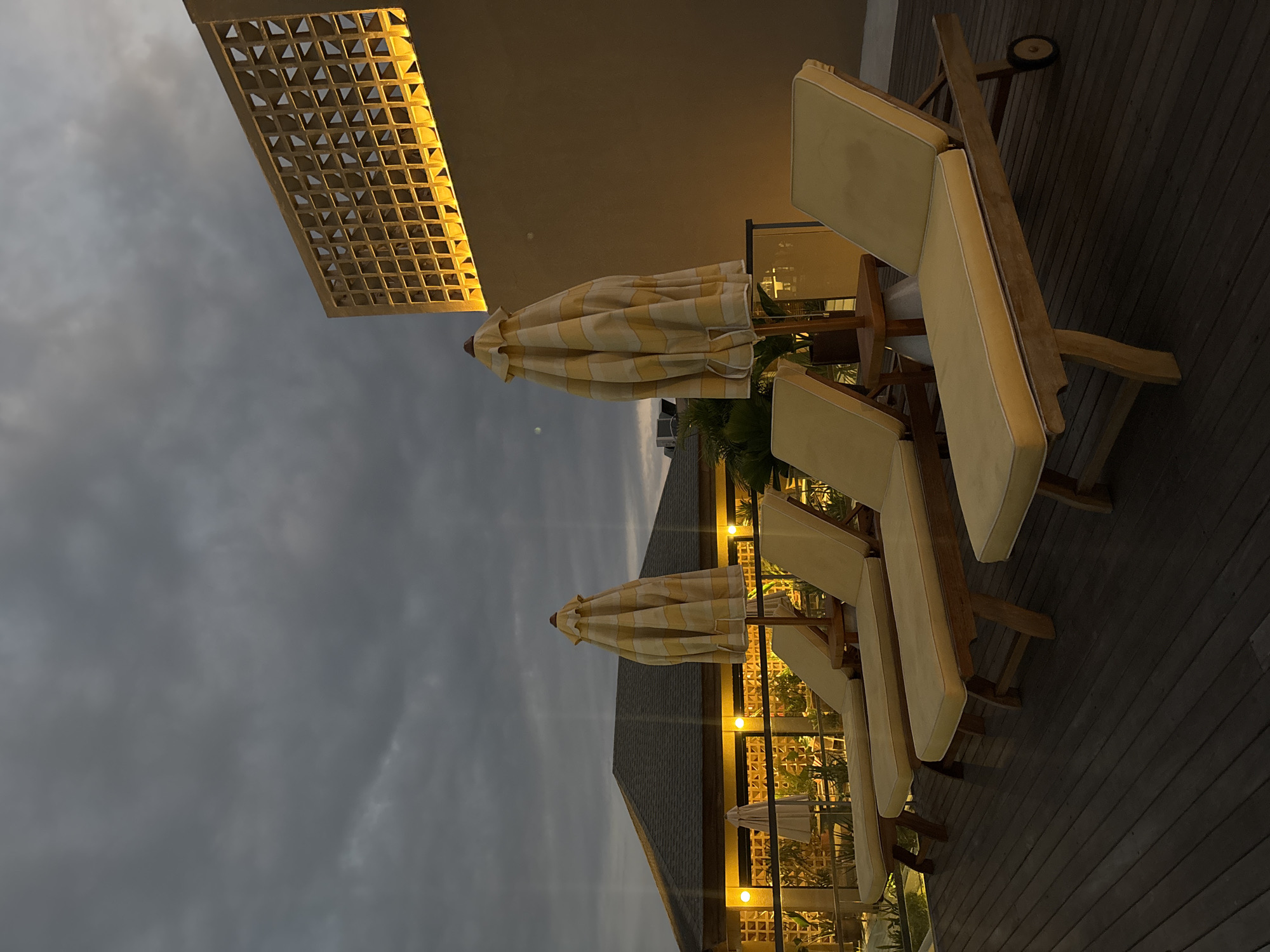 Rooftop drinks and beachside dining at sunset in North Kuta