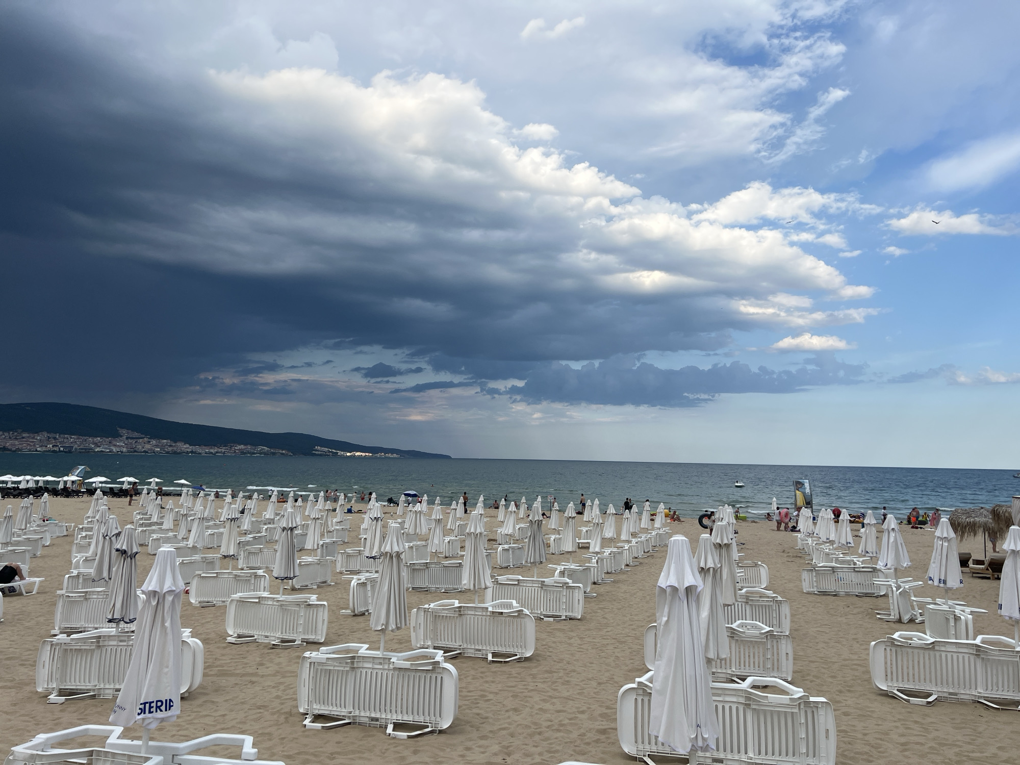Rainbows over Nesebar's beach market at sunset