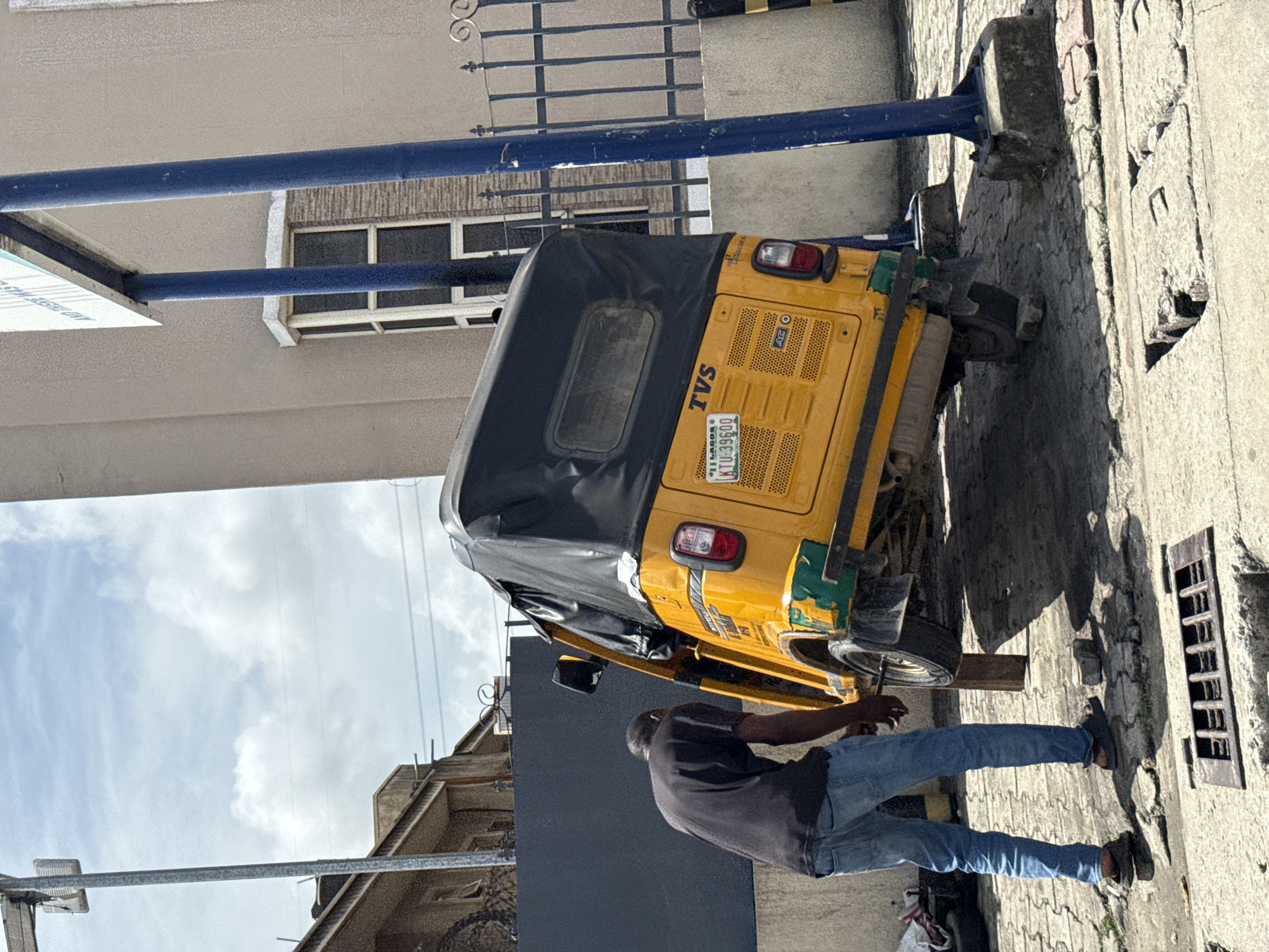 Yellow motorcycle taxi spotted parked in Ado, Nigeria