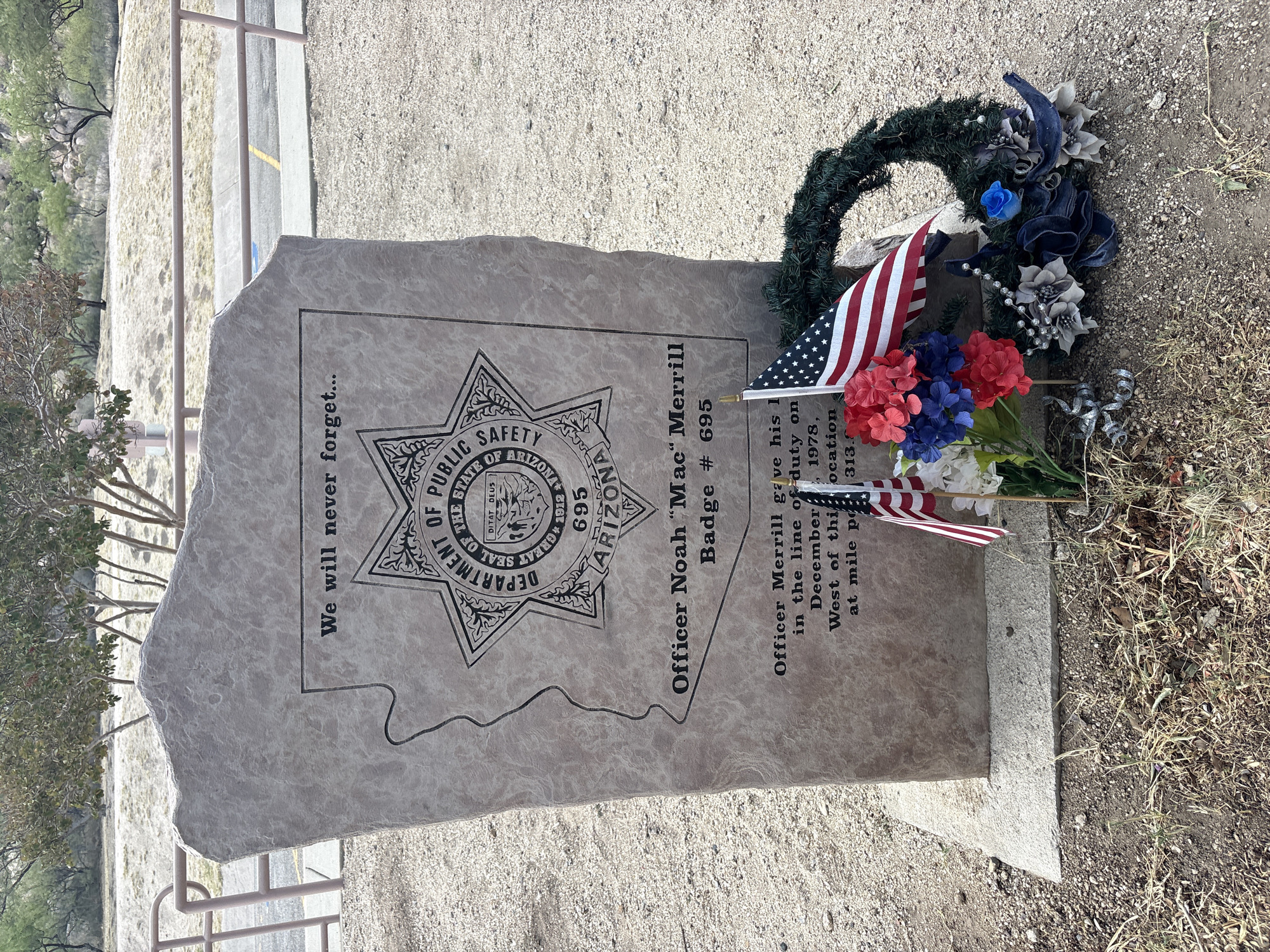 Roadside stop in Dragoon, Arizona with trail signs and memorial