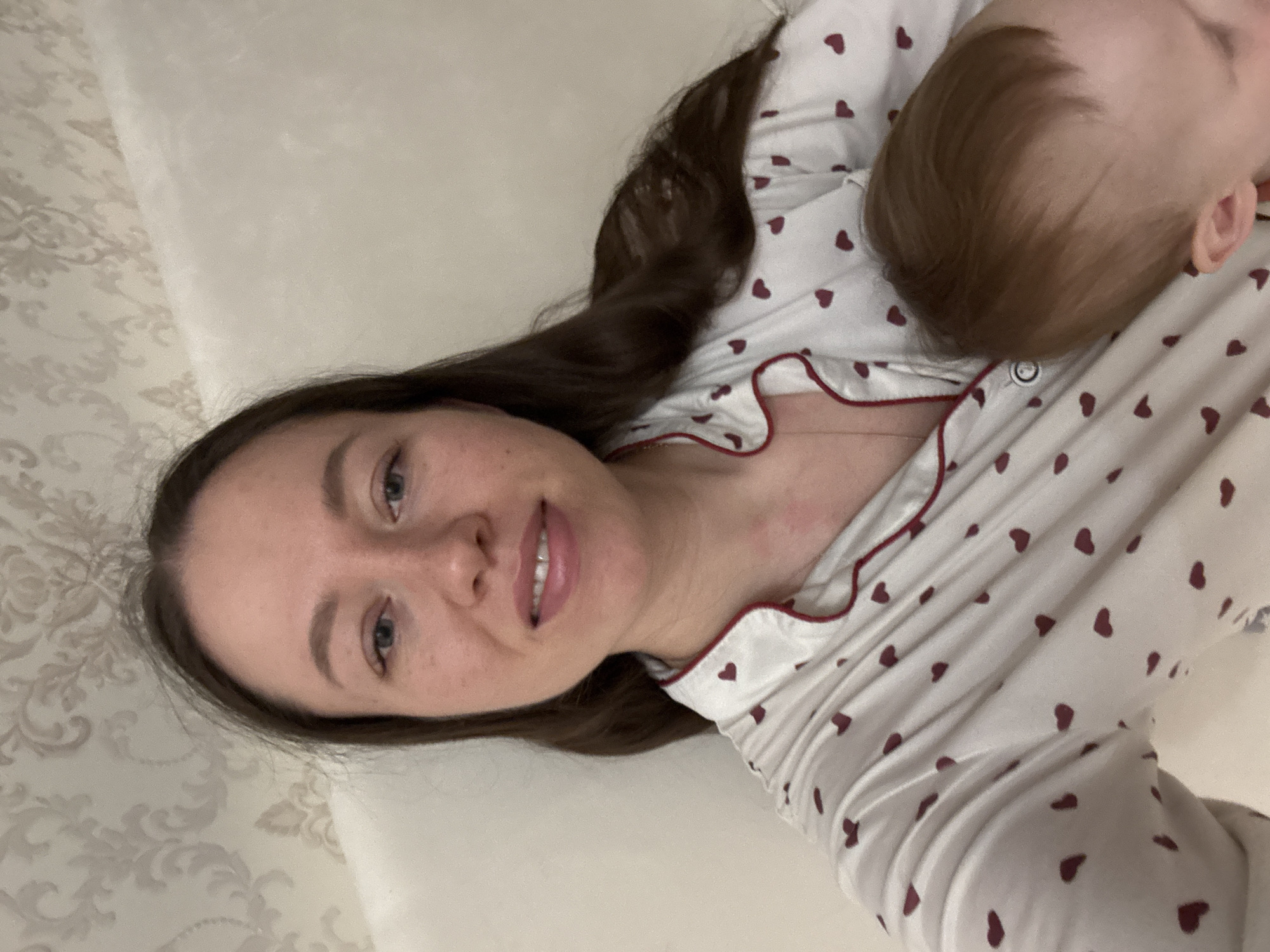 Mother and toddler share quiet afternoon reading, playing at home