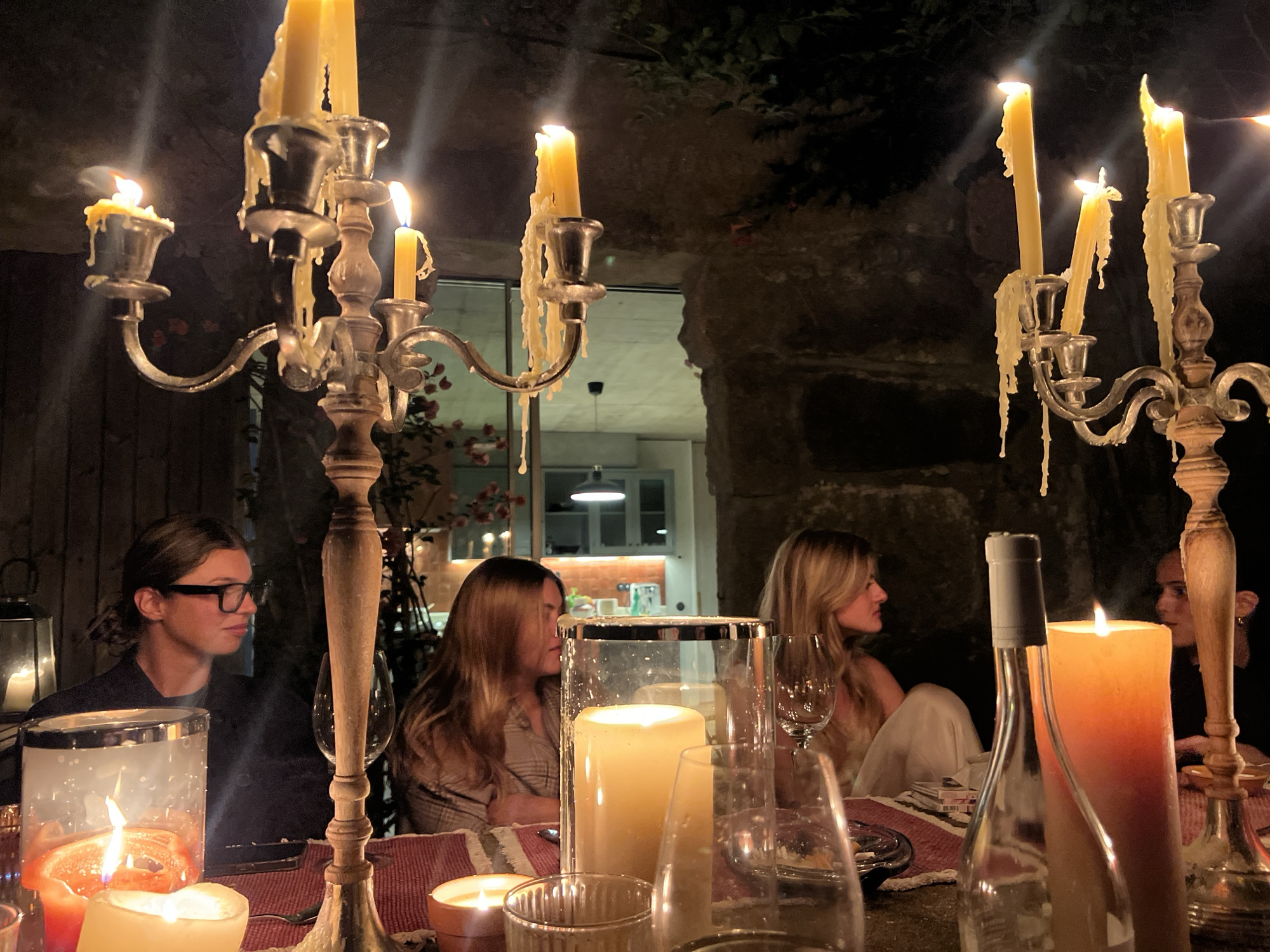 Candlelit outdoor dinner gathering in Vila Nova de Cerveira