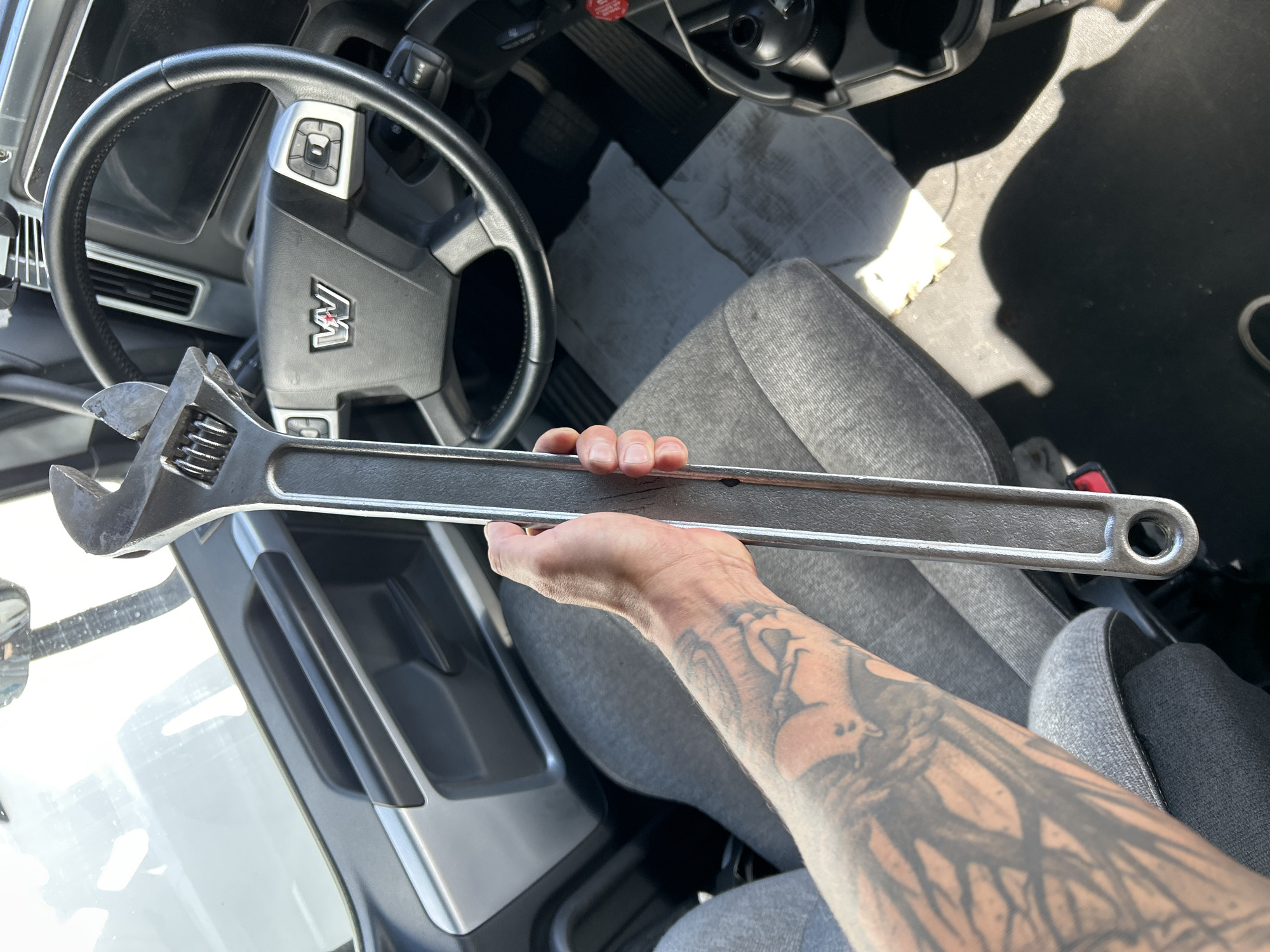 Semi-truck maintenance underway in an Aurora, CO truck lot