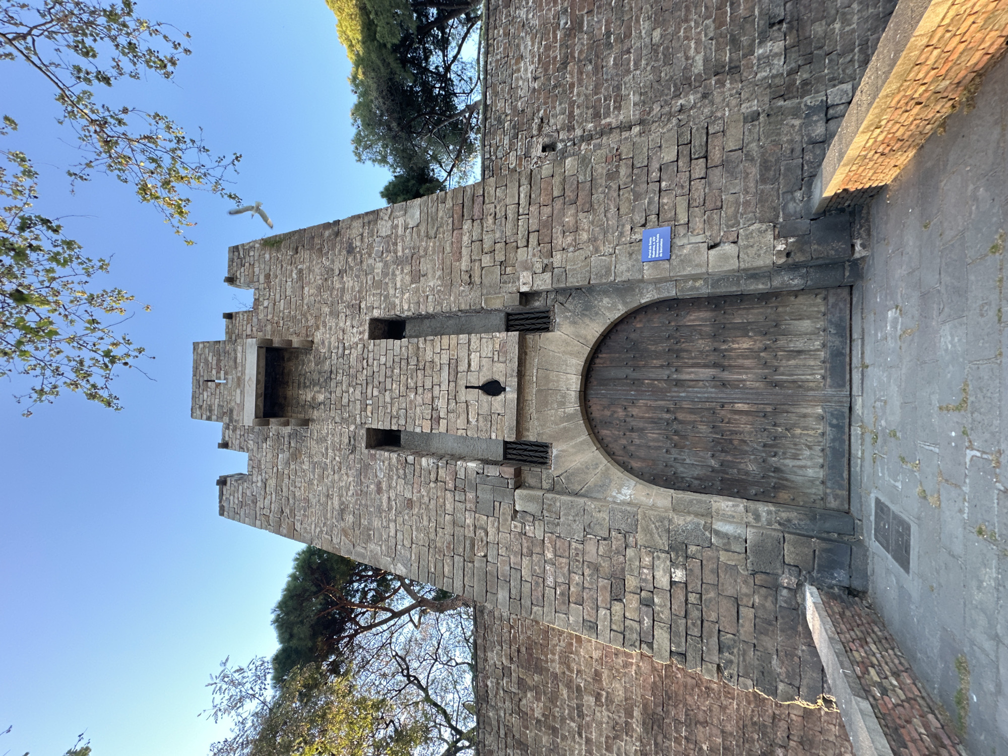 Tourist captures Barcelona castle and waterfront views Saturday evening