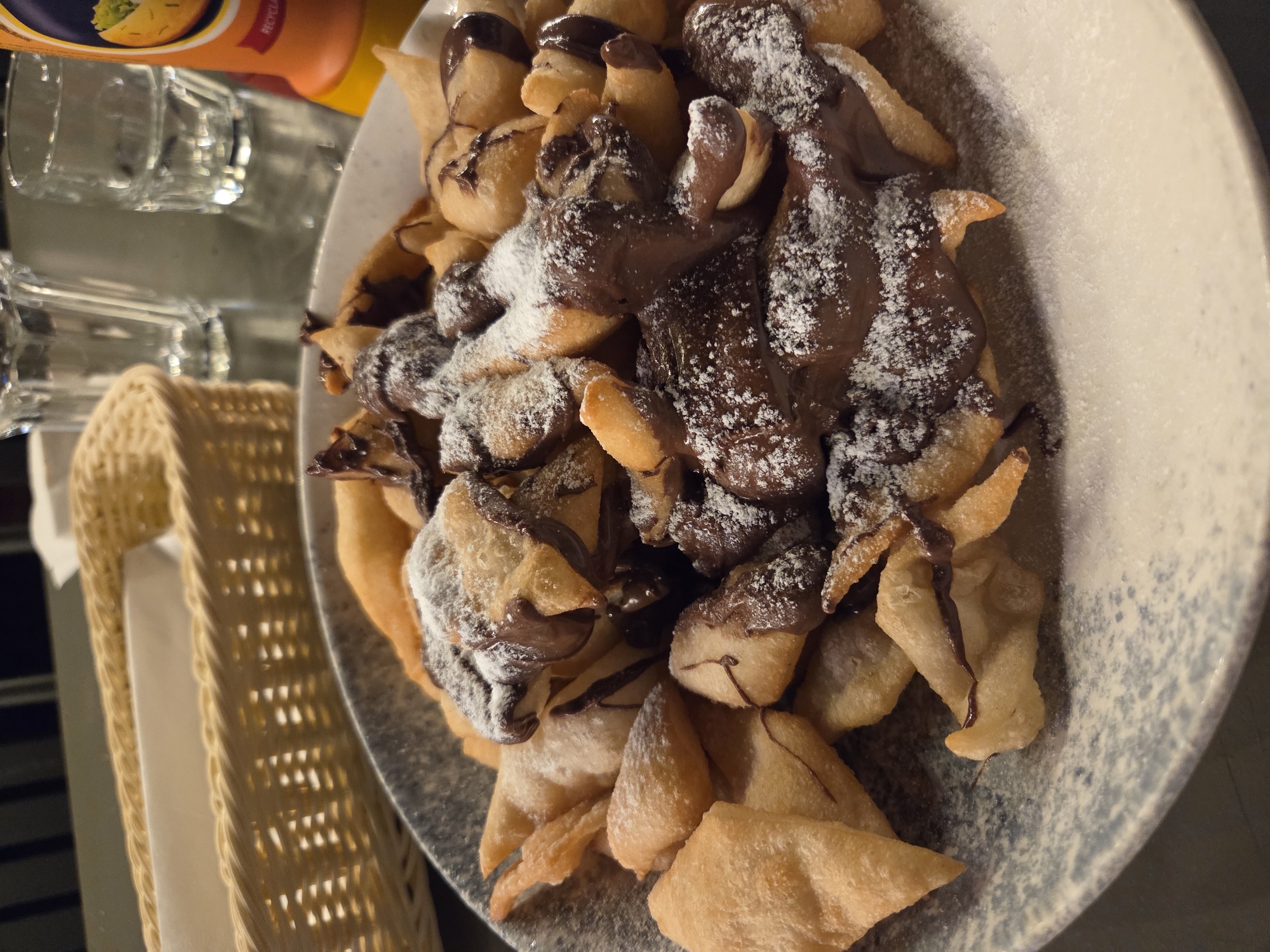 Witness captures plate of fried dough pastries