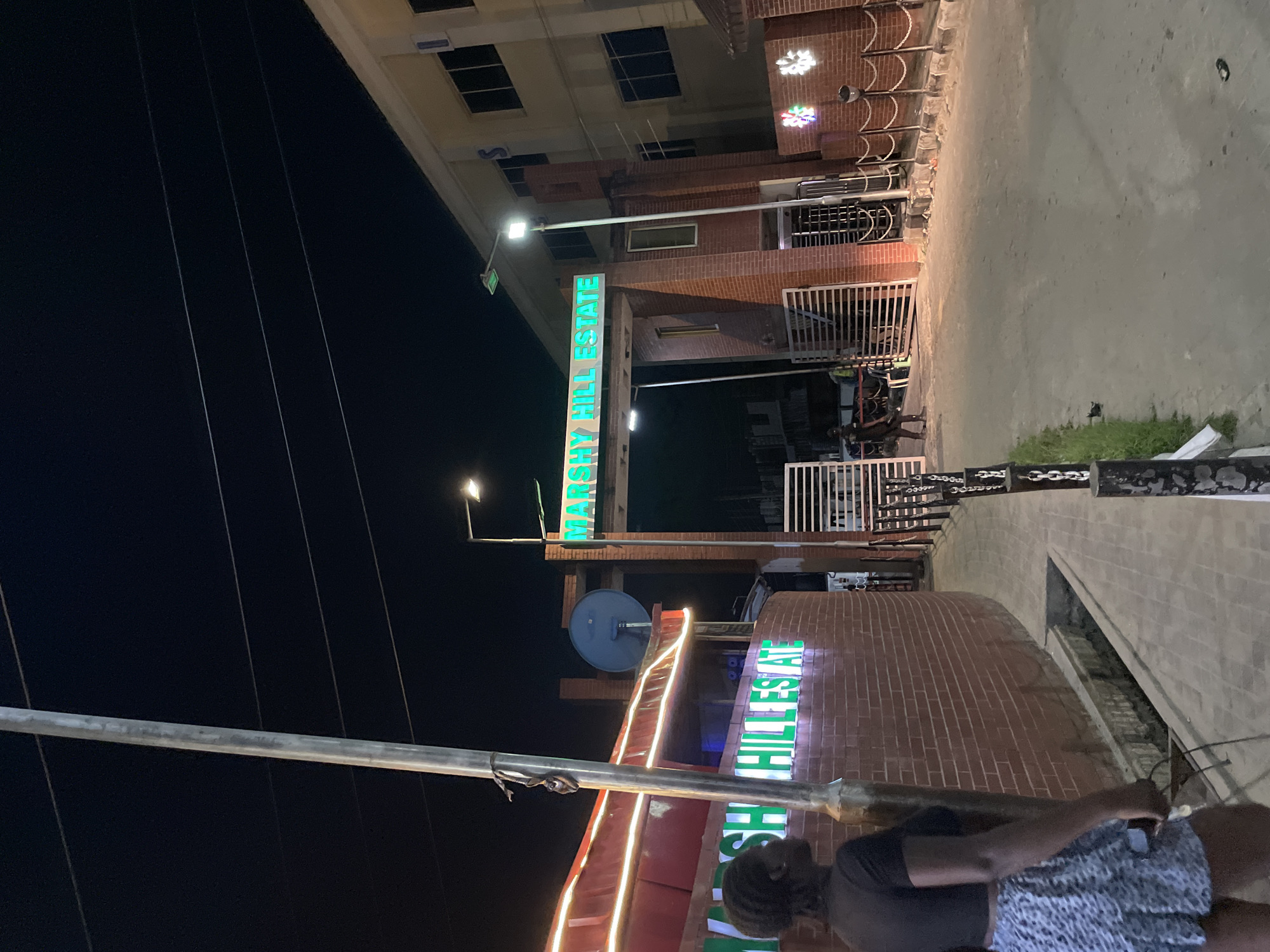 Late-night street life around Marshy Hill Estate, Ikorodu and Ado