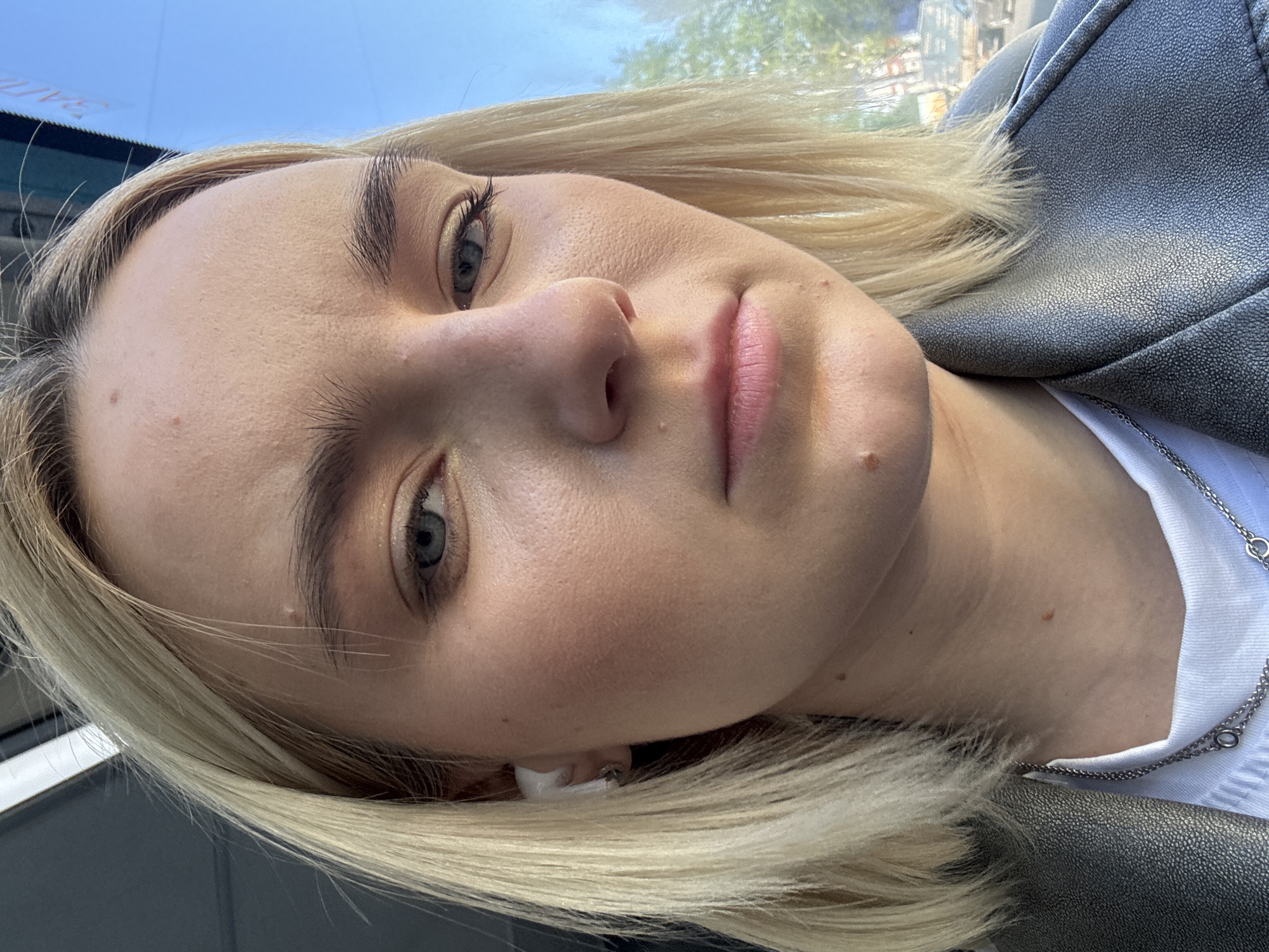 Woman photographs herself on Saint Petersburg public transport