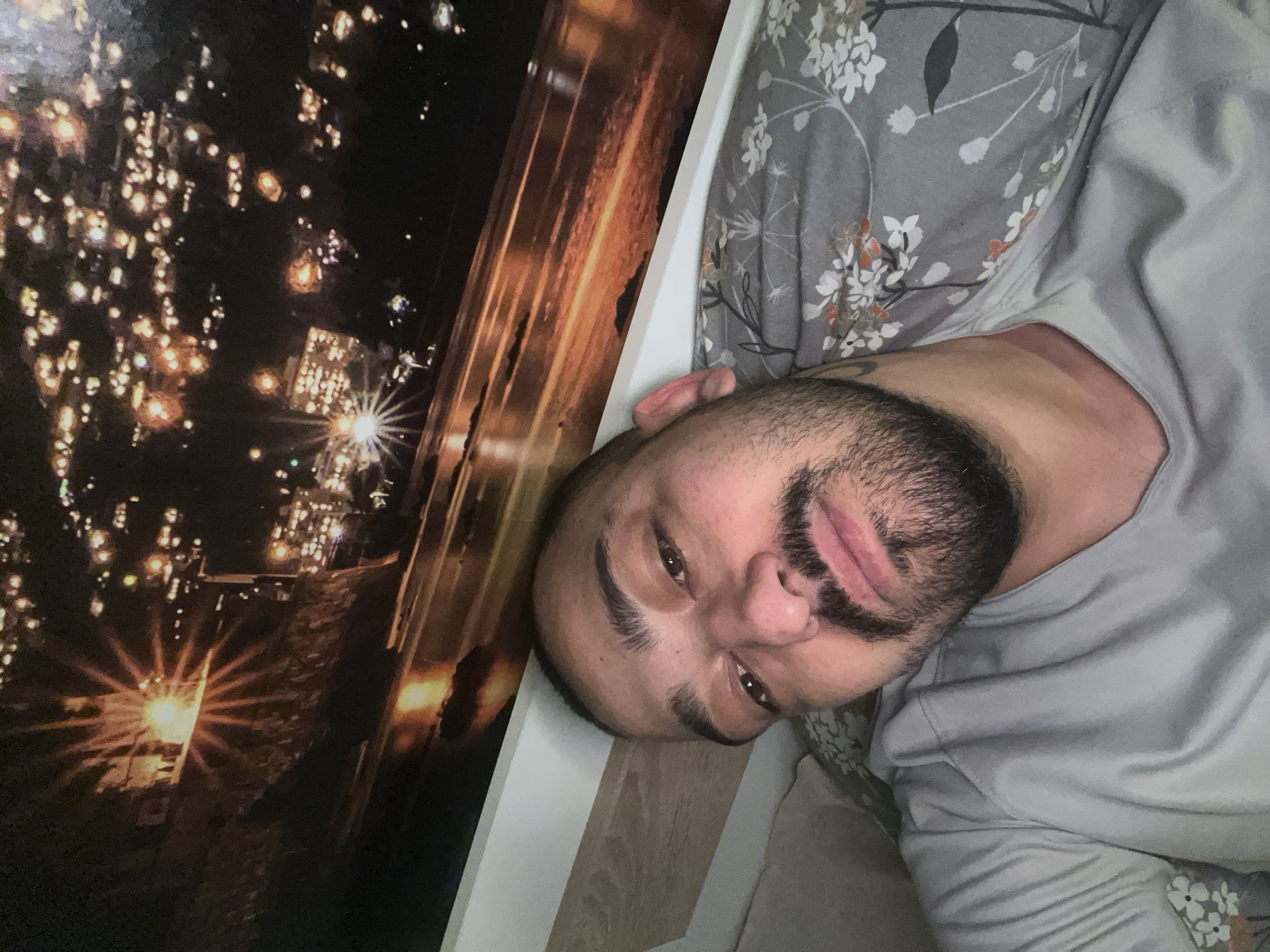 Man resting in bedroom in Shumata, Bulgaria