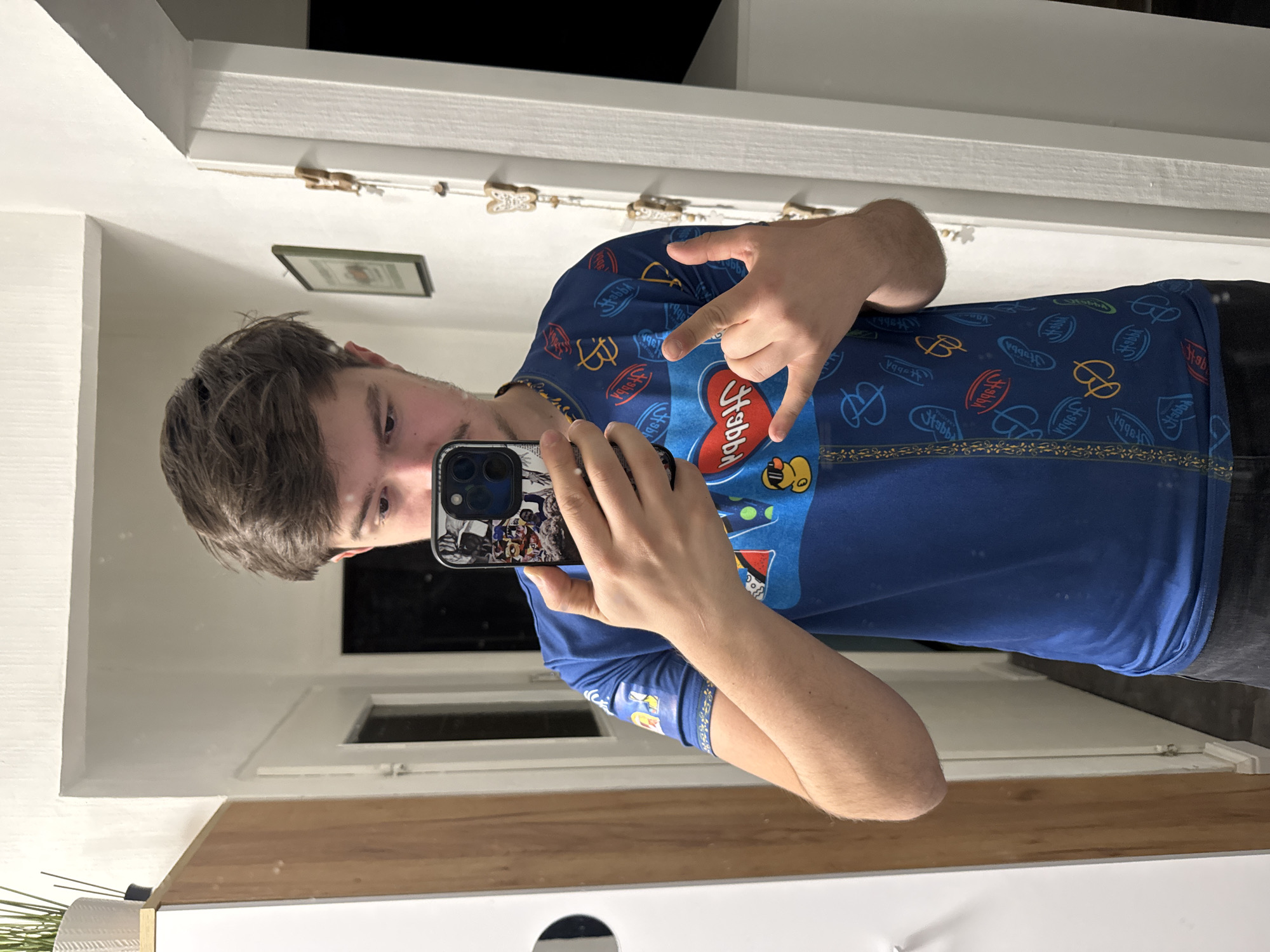 Person takes bathroom mirror selfies in Sofia residence