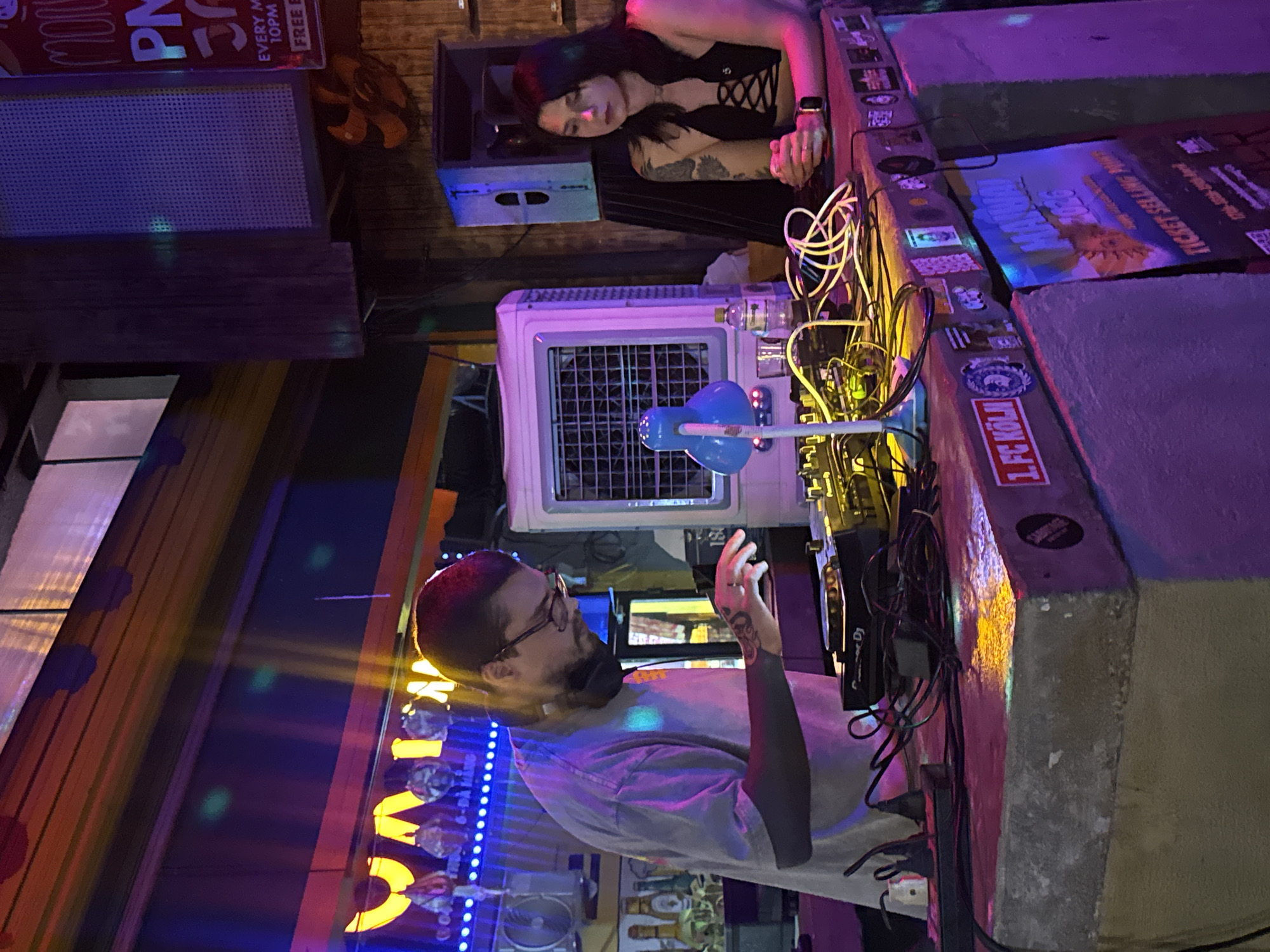 DJ performs at nighttime venue in Đà Nẵng, Vietnam