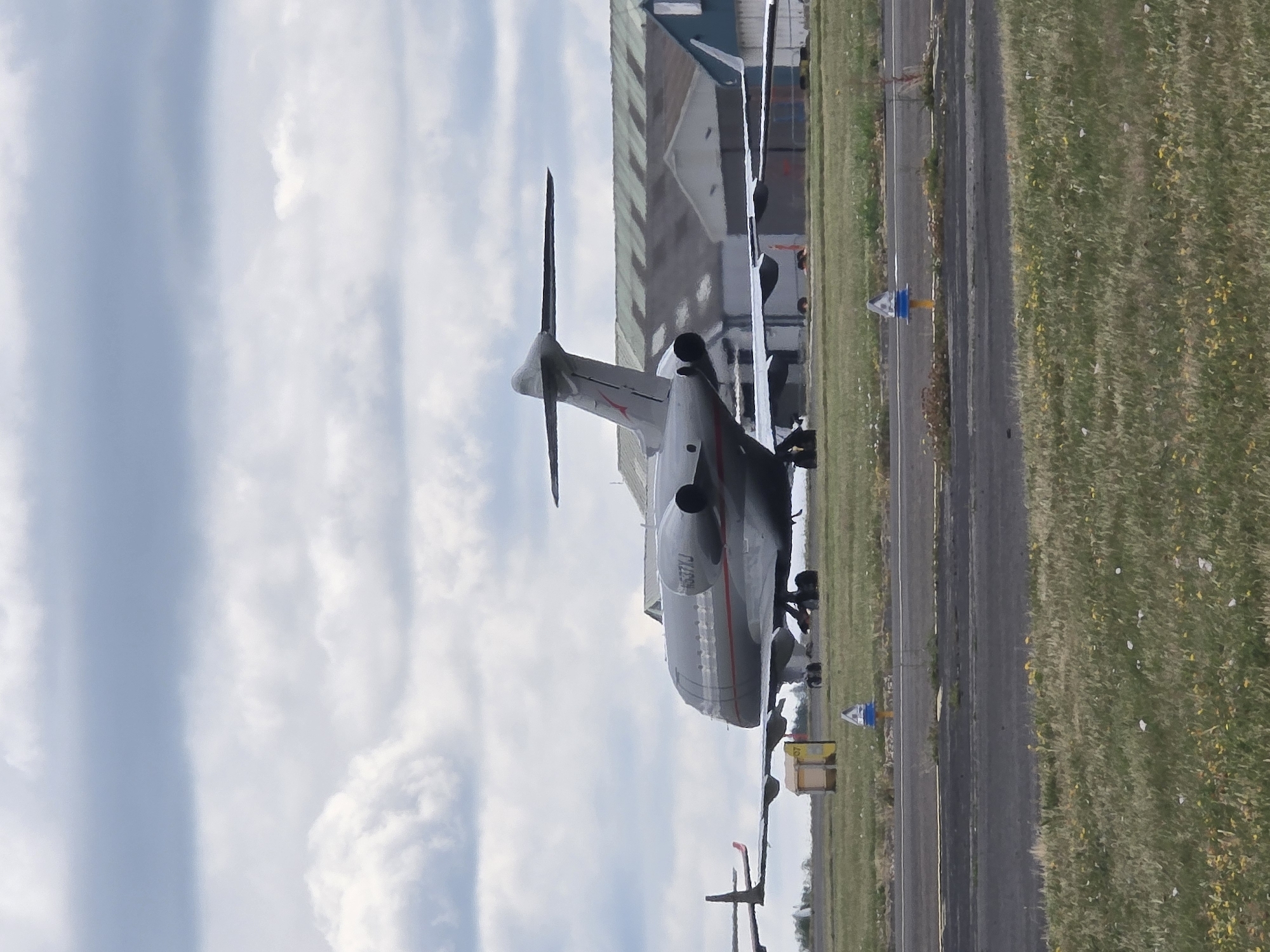 Private jets and prop planes at a quiet London-area airfield