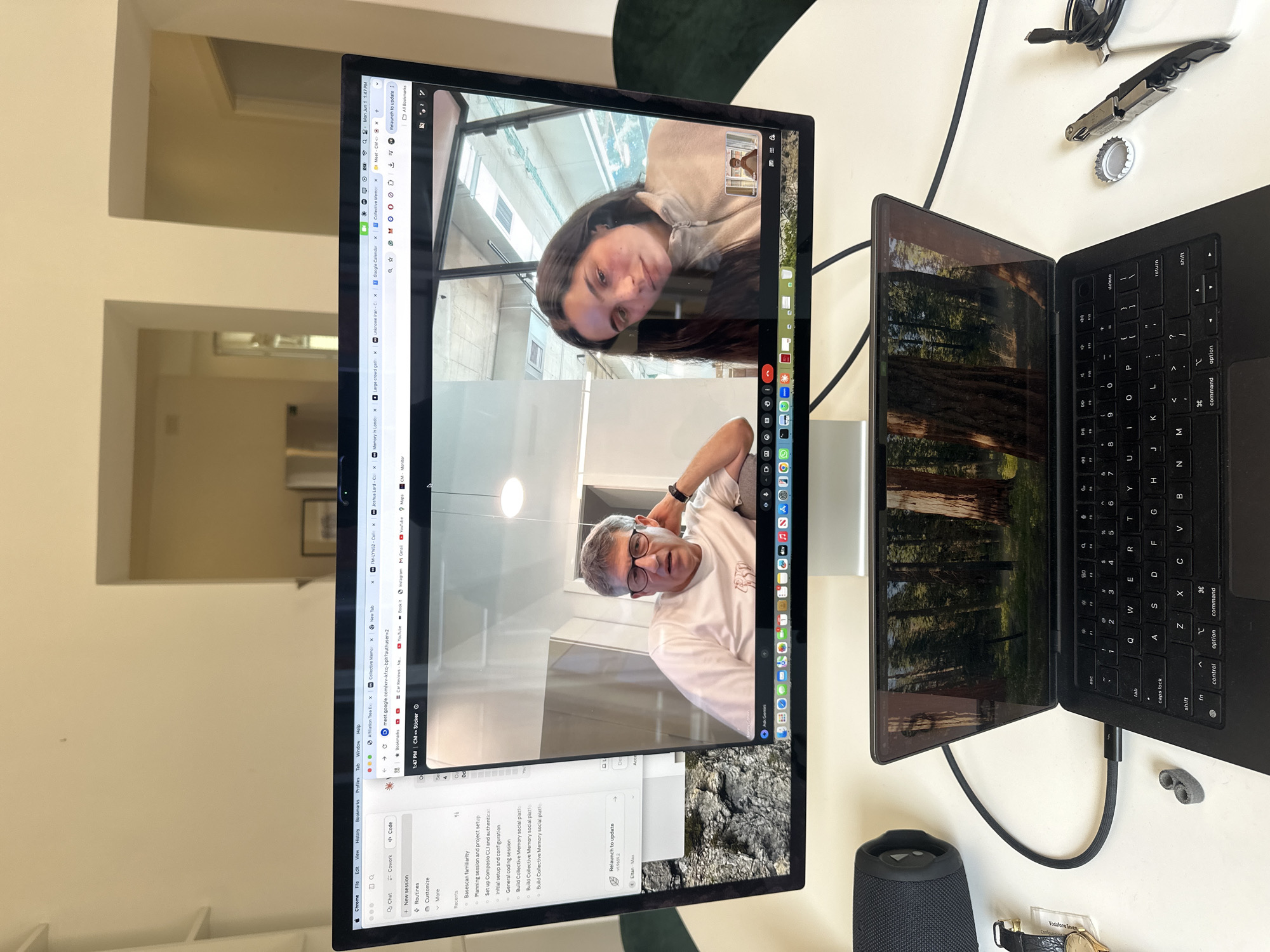 Video call observed on dual screen setup in Milan