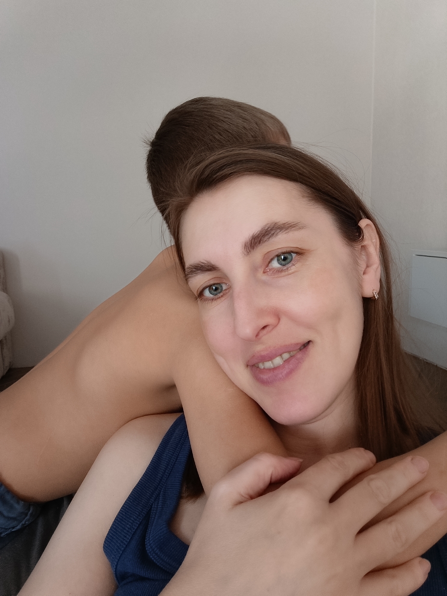 Mother and son share playful morning at home in Russia