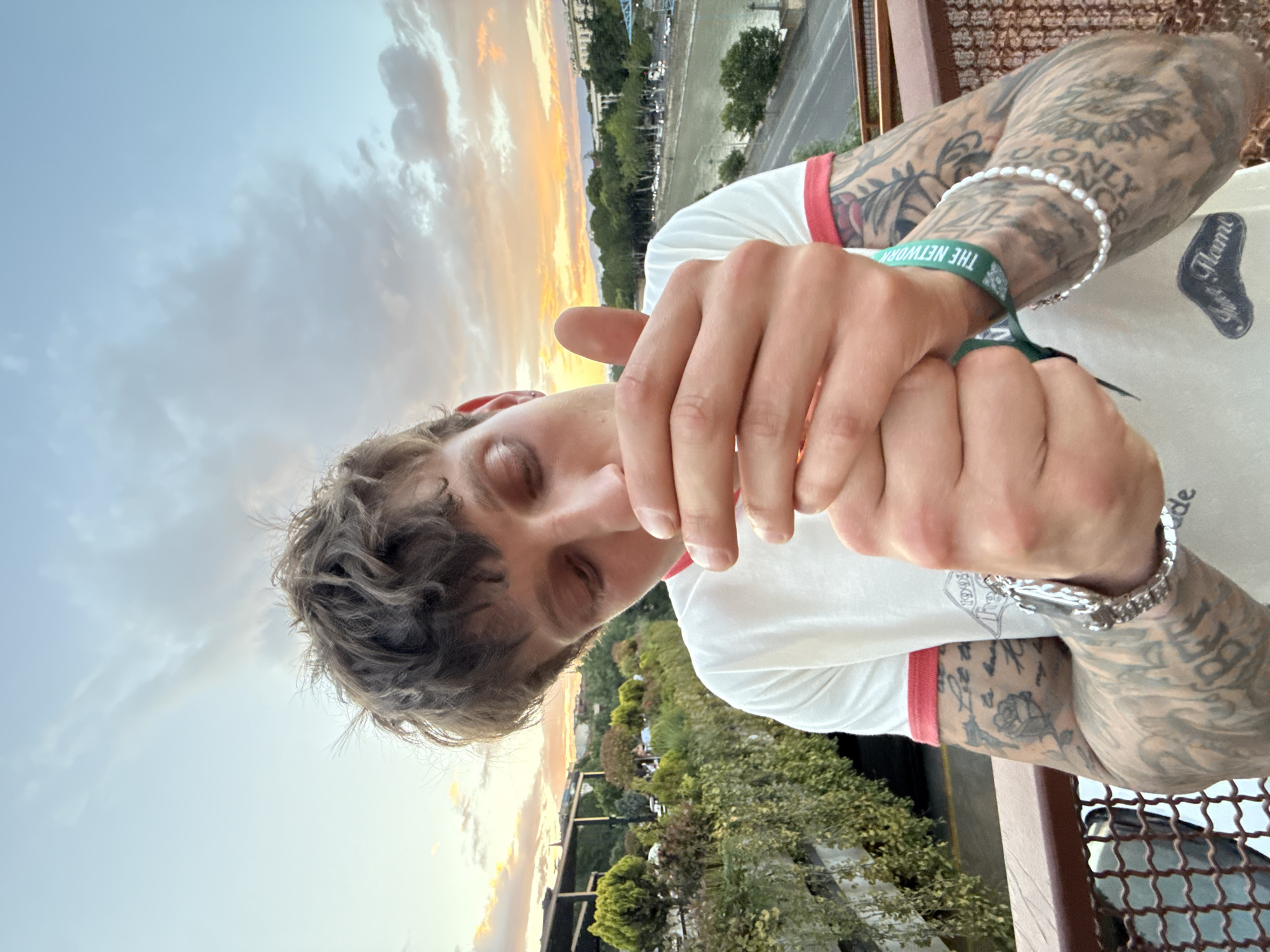 Balcony views and a selfie at sunset over Tbilisi