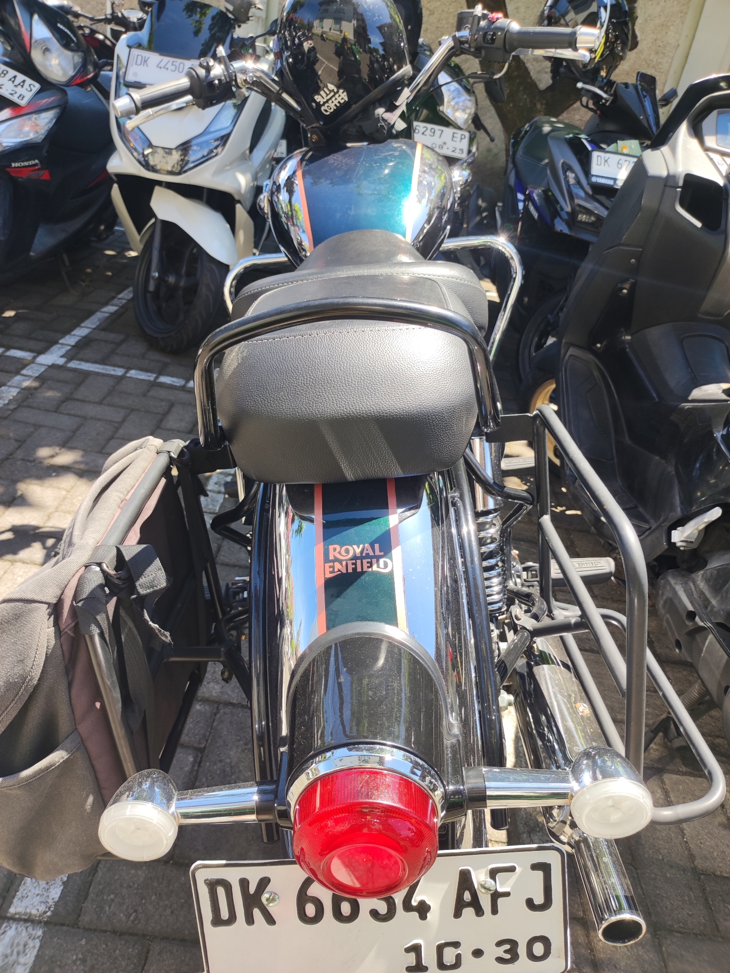 Royal Enfield motorcycle parked in Denpasar parking area
