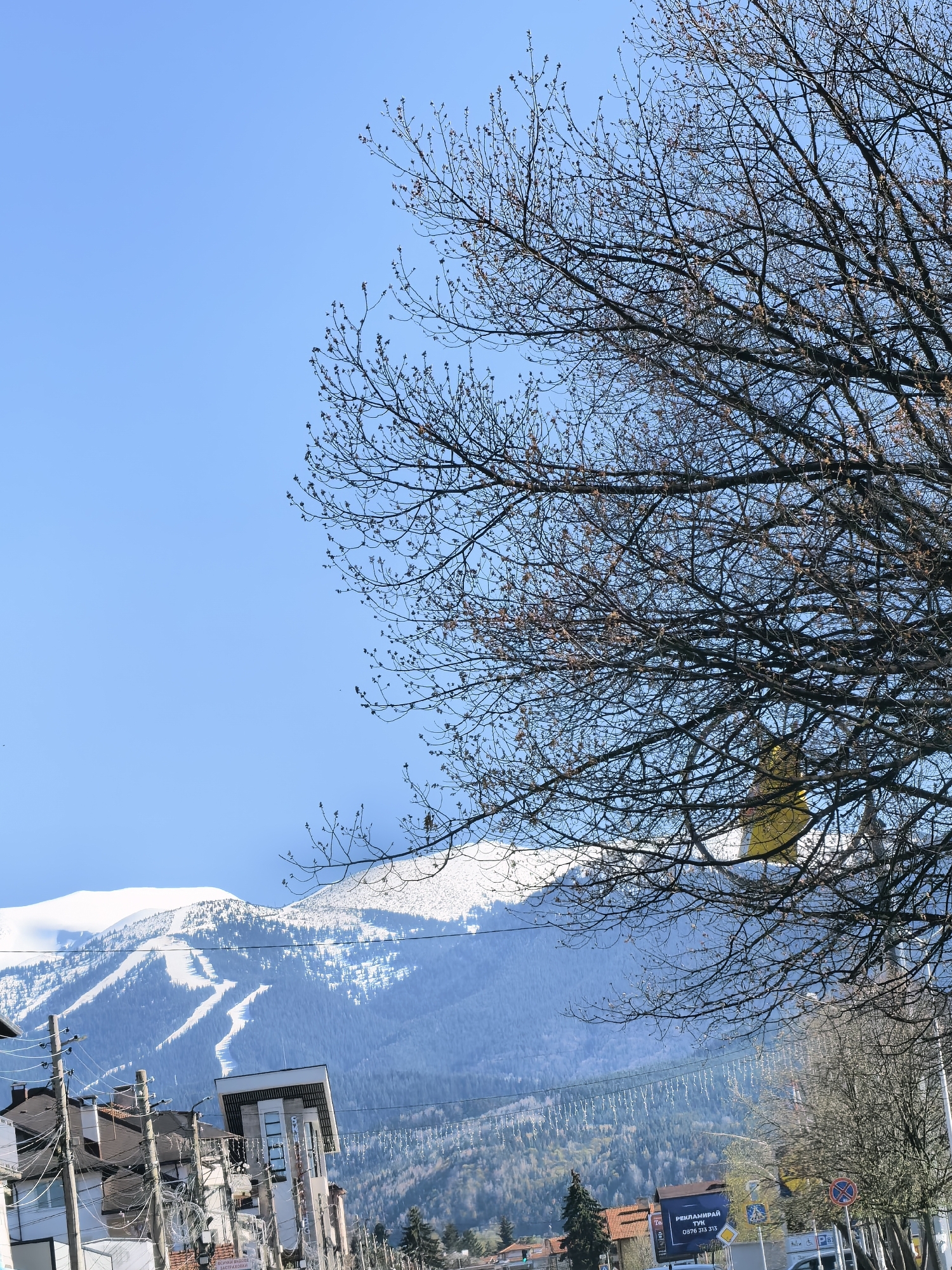Street scene captured in Samokov with Rila Mountains backdrop