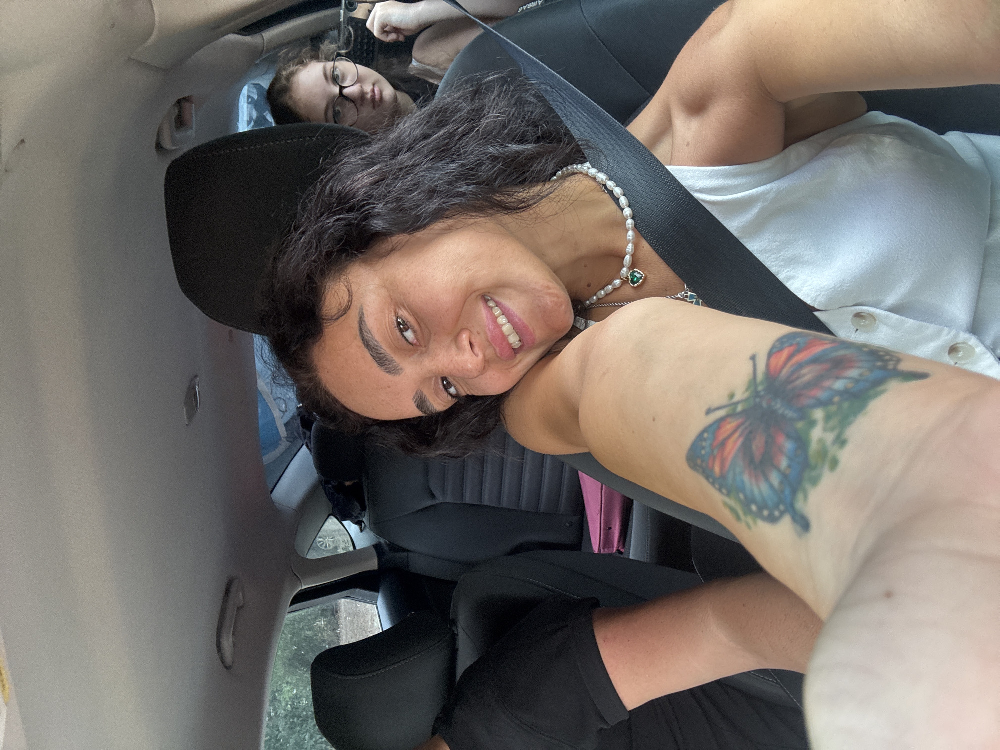 Passenger selfie moment inside a car in Tbilisi