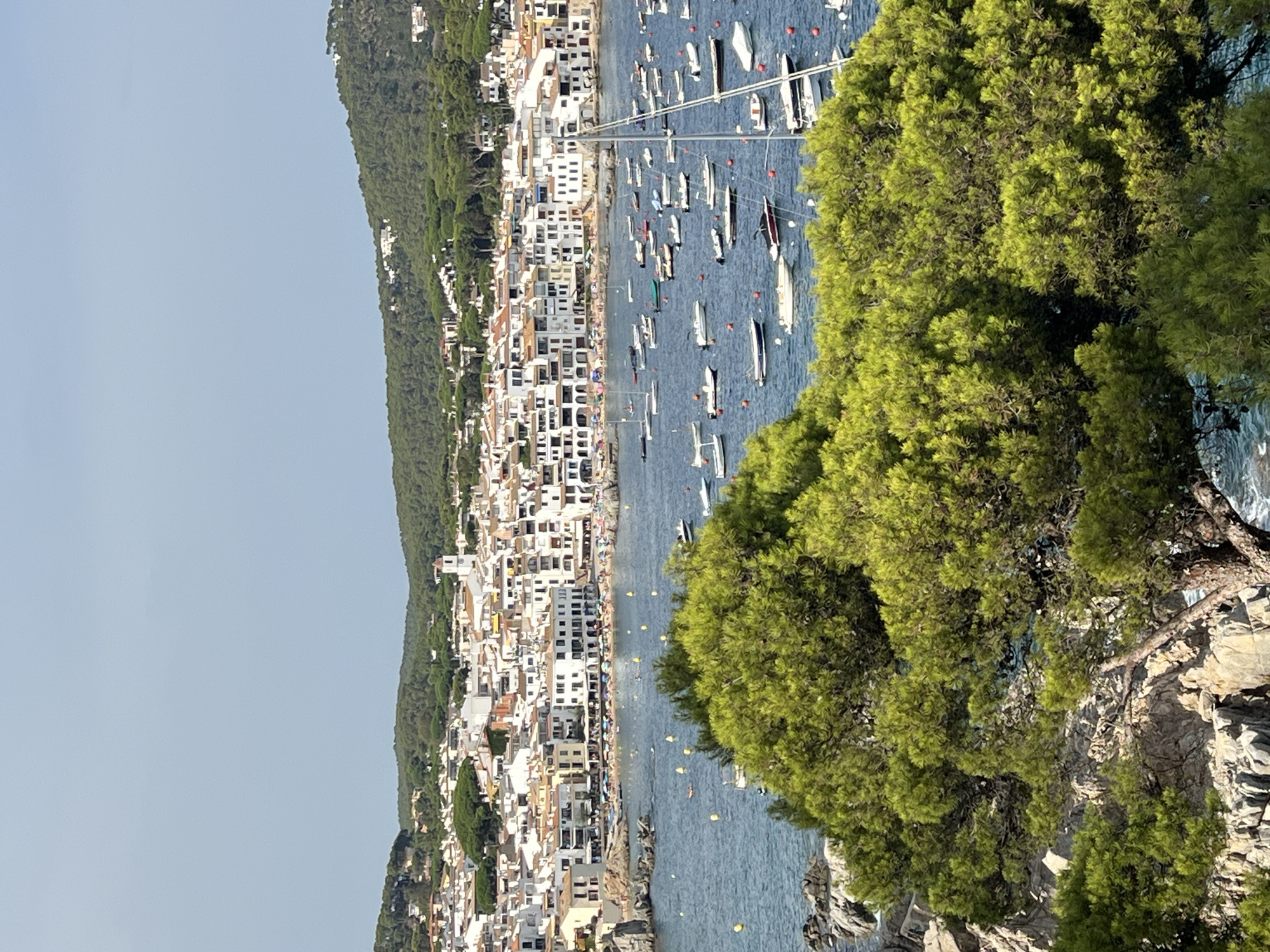 Crowded summer beach day at Calella de Palafrugell