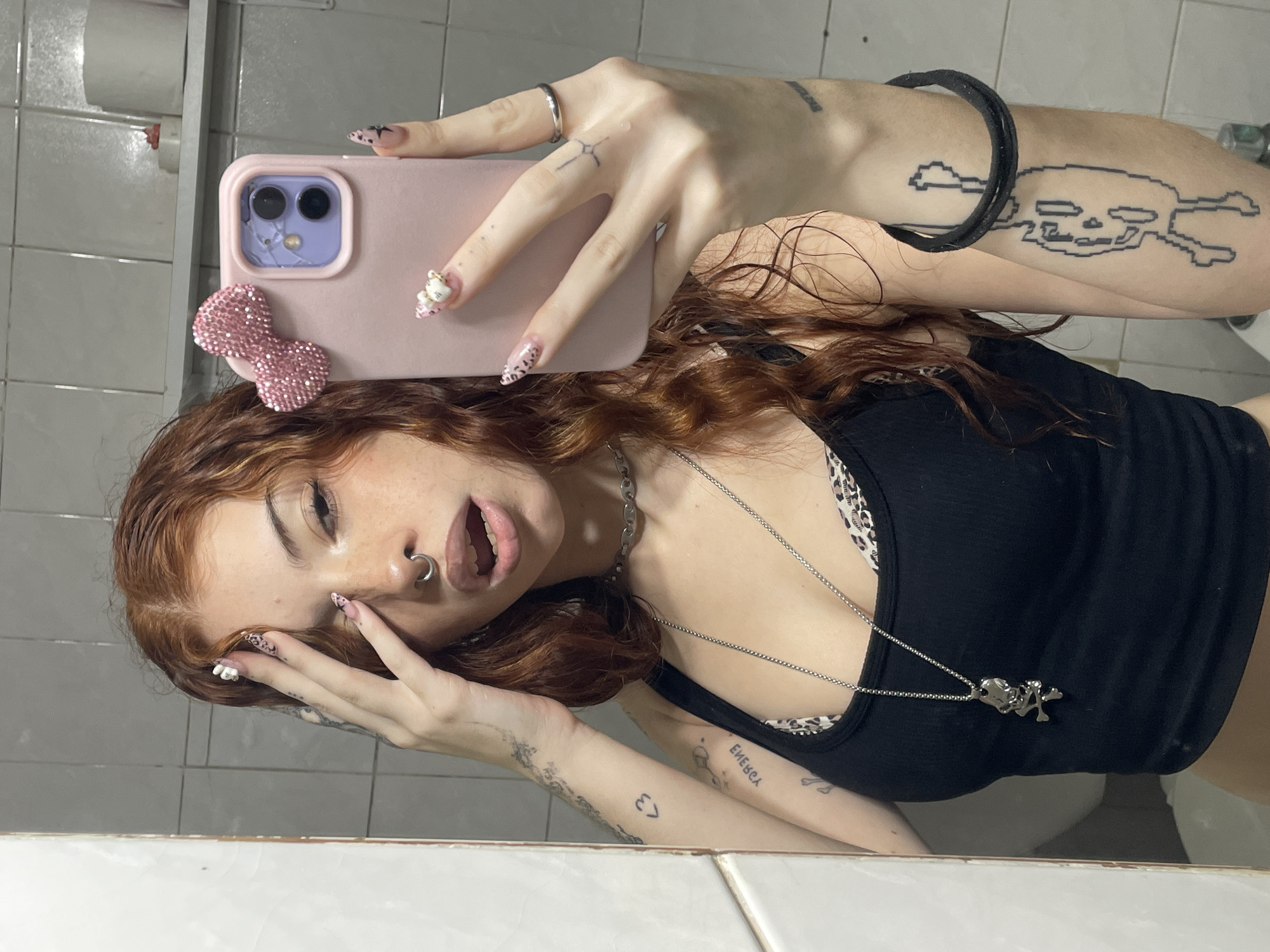 Mirror selfies captured in Buenos Aires bathroom Thursday evening