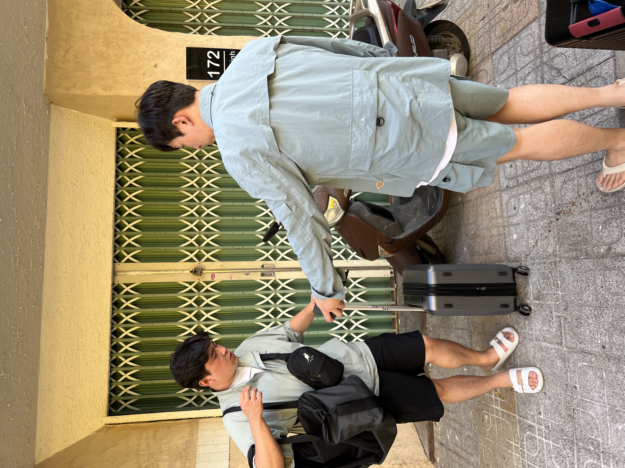 Everyday street life along a Nha Trang commercial block