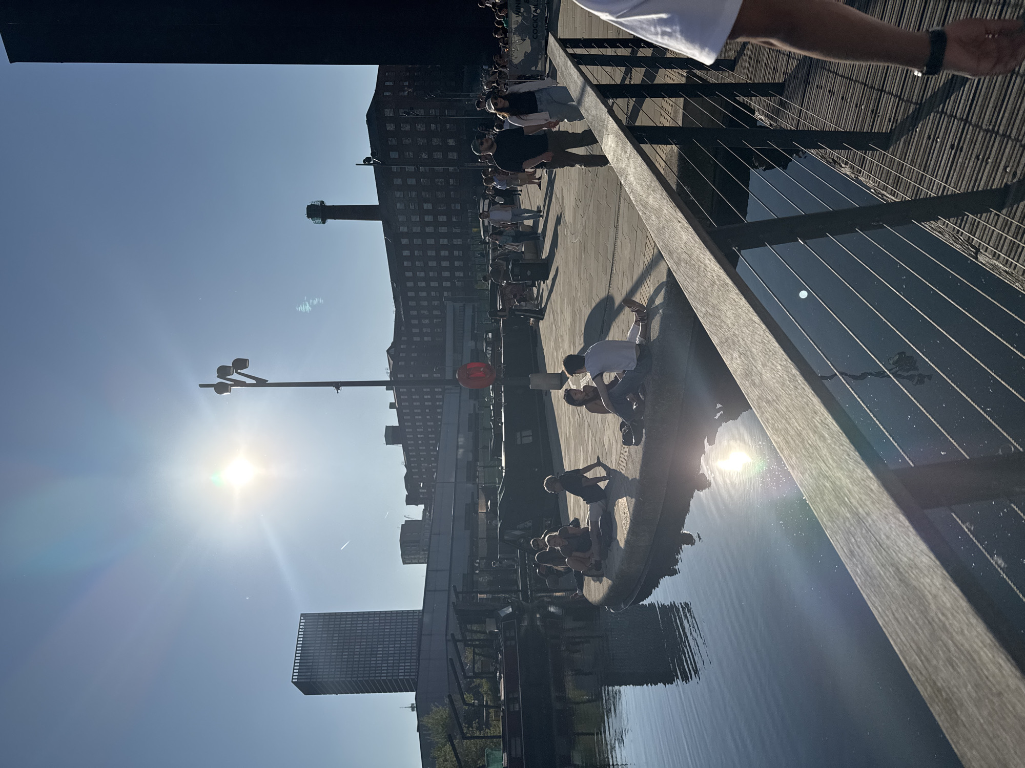 Sunny waterfront scene captured in Manchester on spring afternoon