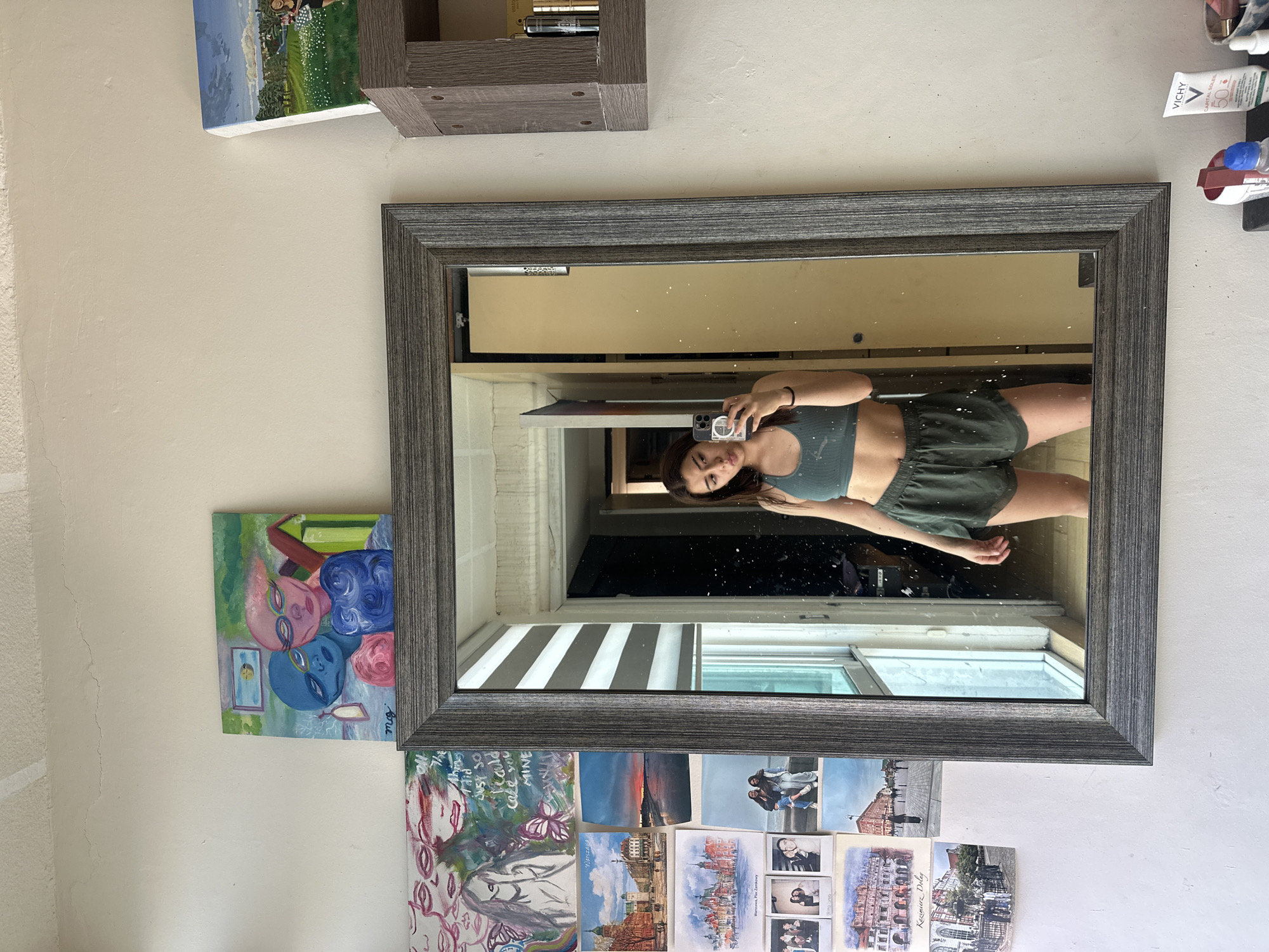 Person takes selfie, rests indoors in Puebla