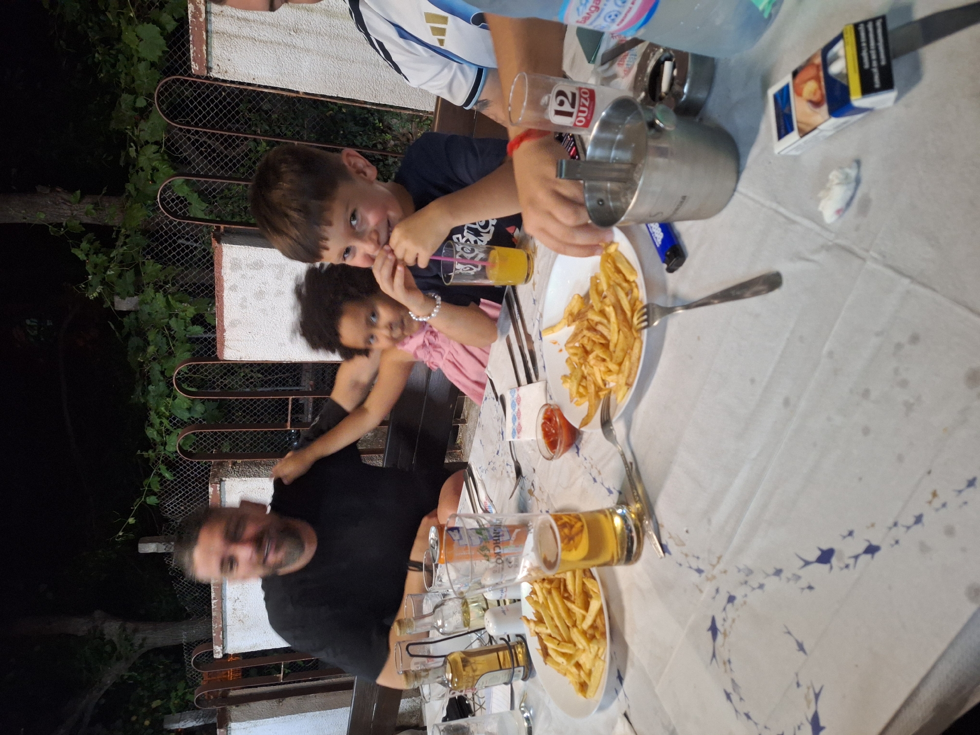 Outdoor dinner gathering at a Blagoevgrad restaurant, July evening