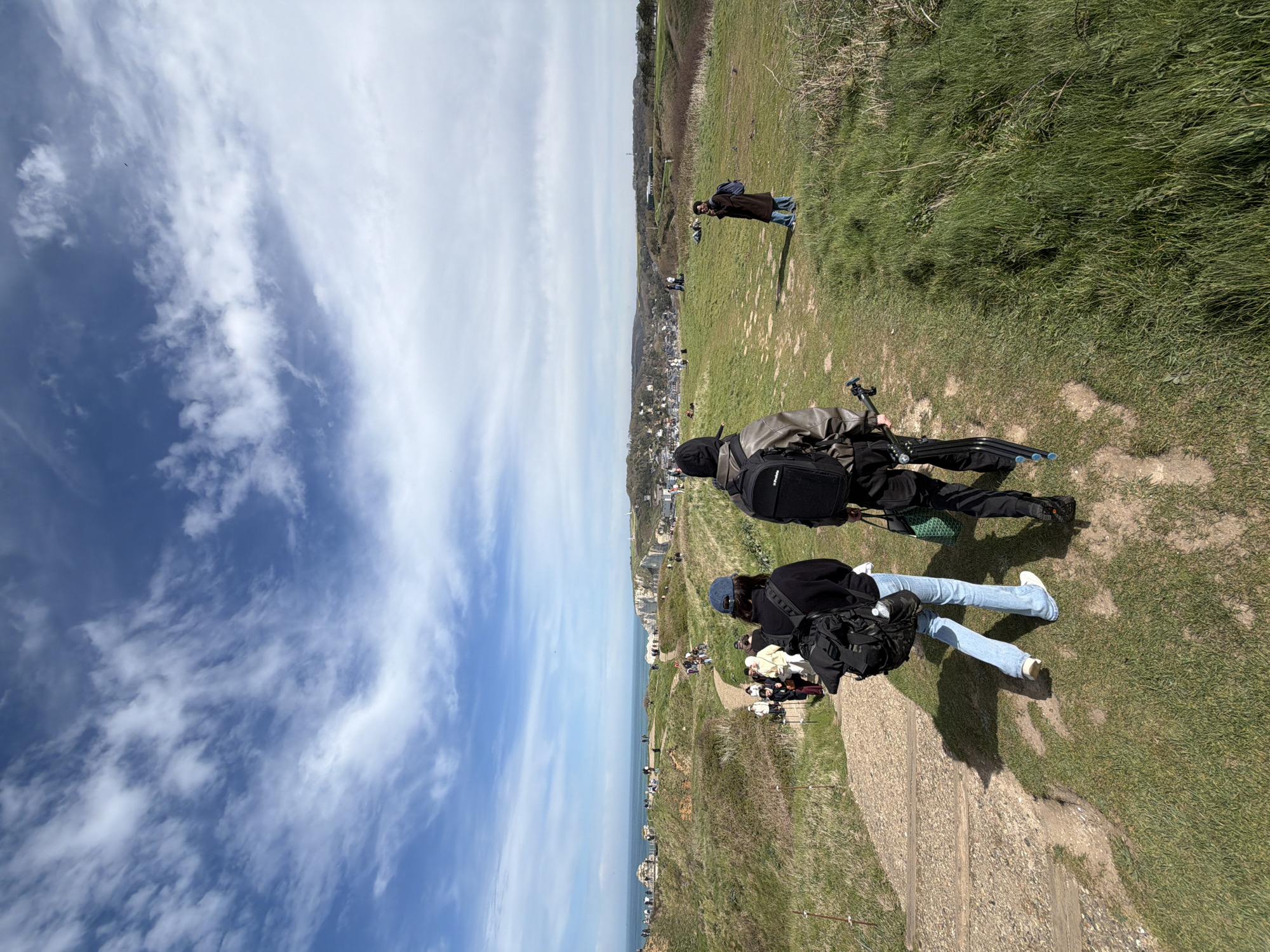 Two visitors spotted on Étretat cliffs under sunny skies