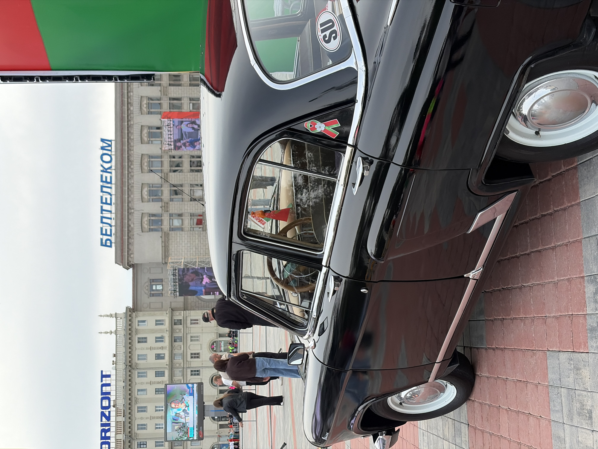 Vintage Soviet car on display at a Minsk plaza