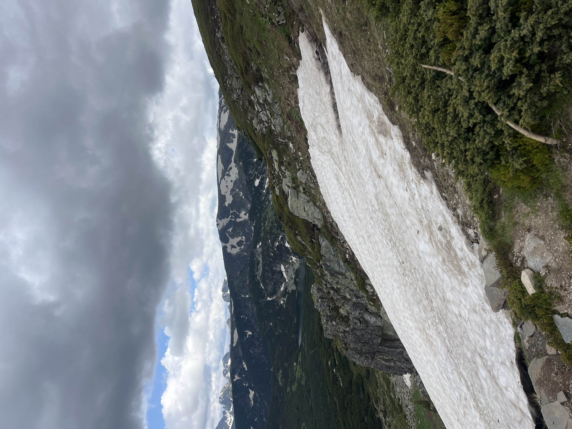 Rila Mountains in transition: snow, wildflowers, chairlifts, and trail dogs