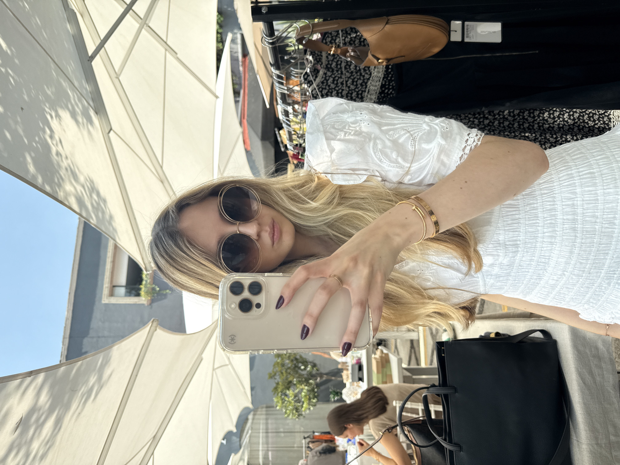 Woman shops luxury goods market in Mexico City