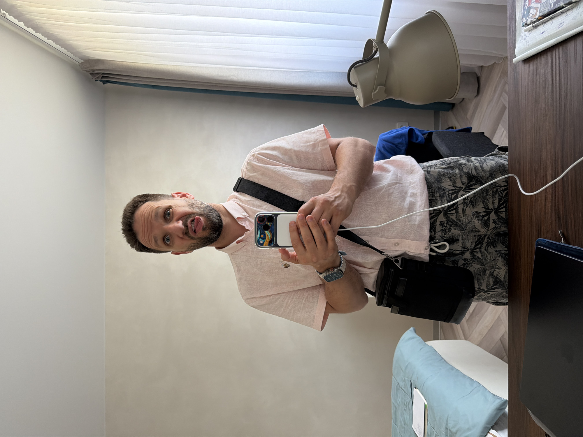 Man takes mirror selfie in Strelna, Russia
