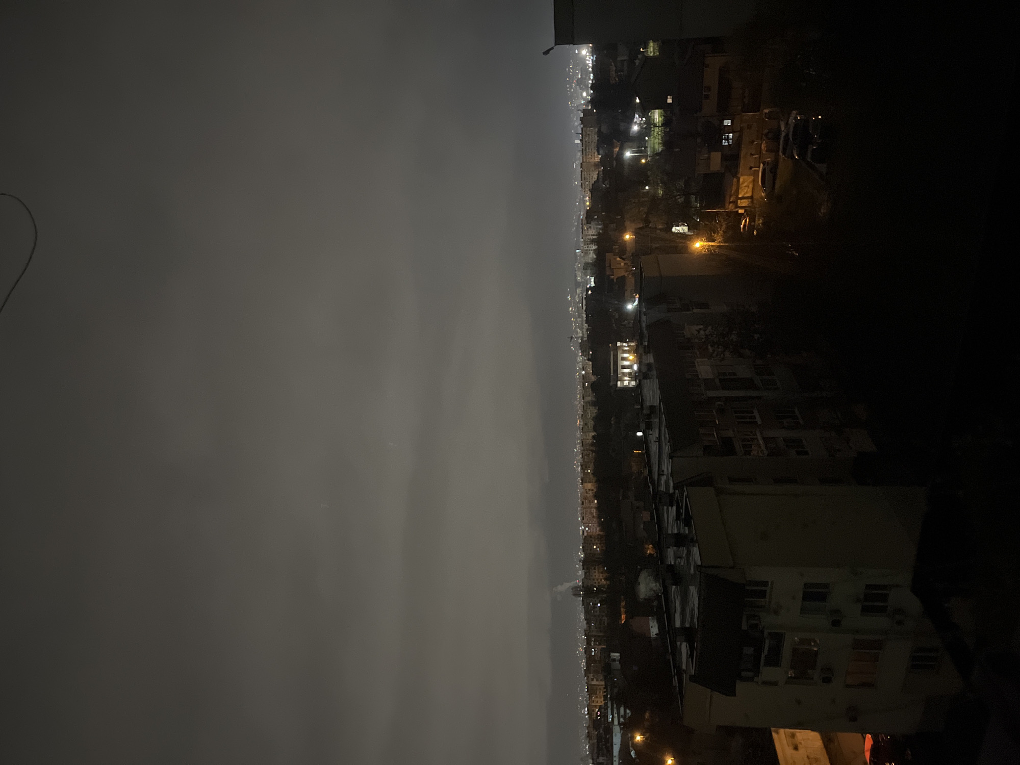 Nighttime cityscape views captured across Sofia under overcast skies