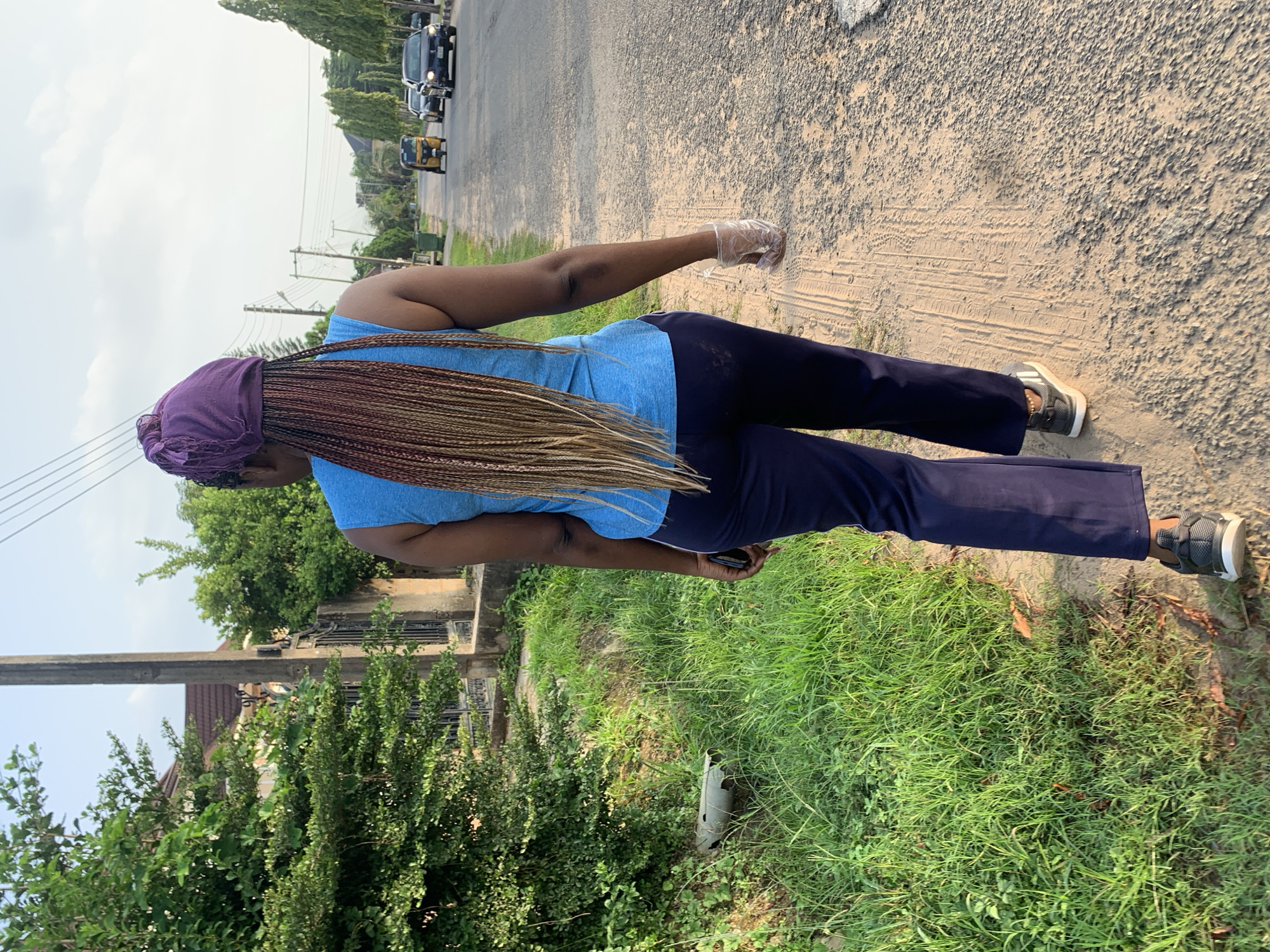 Morning street life along a residential road in Abuja