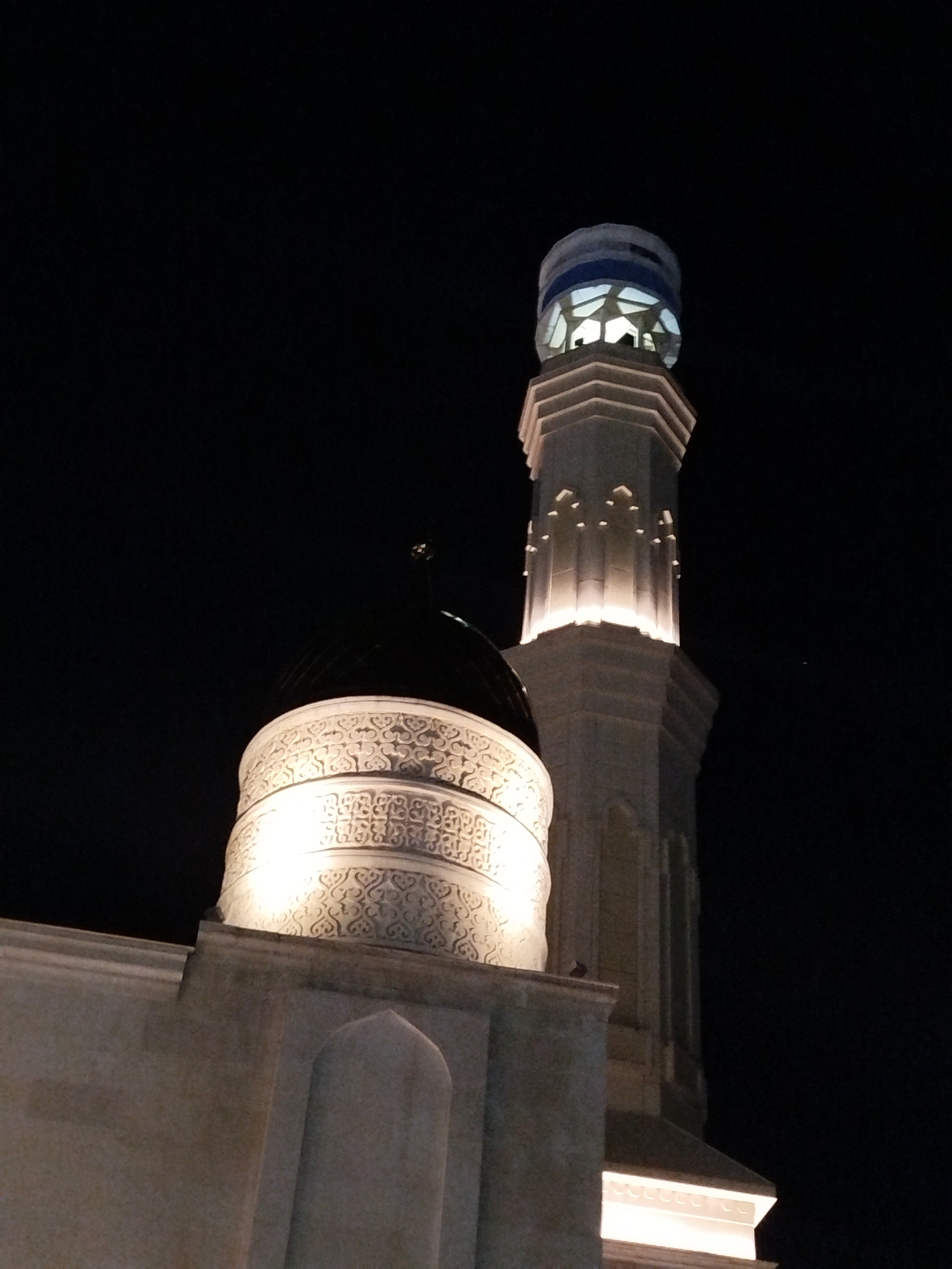 Night visit to an illuminated mosque in Kokshetau, Kazakhstan