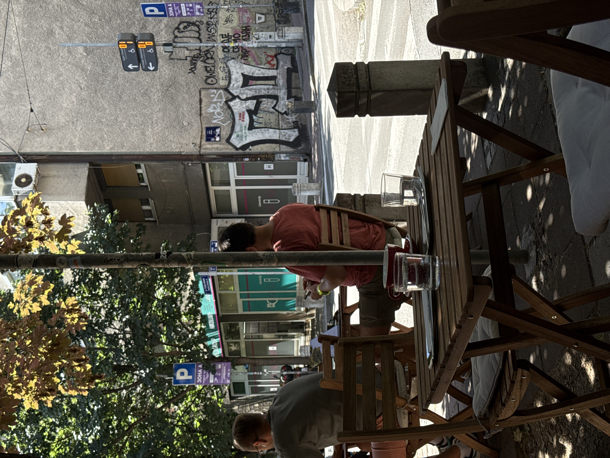 Morning cafe life documented on Belgrade's Tsar Uroša Street