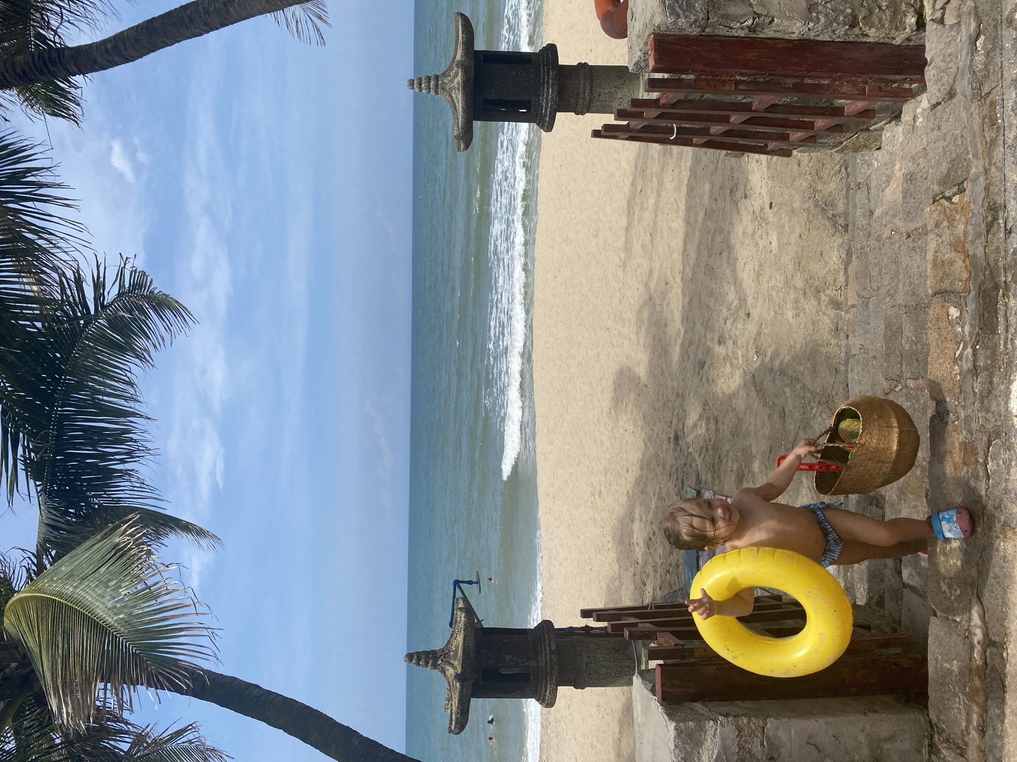 Early morning beach family time in Phu Thuy Ward Vietnam