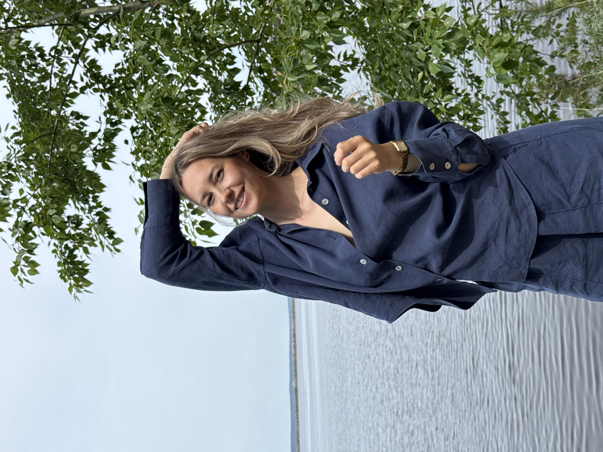Woman photographed at waterfront locations in Chaikovsky, Russia