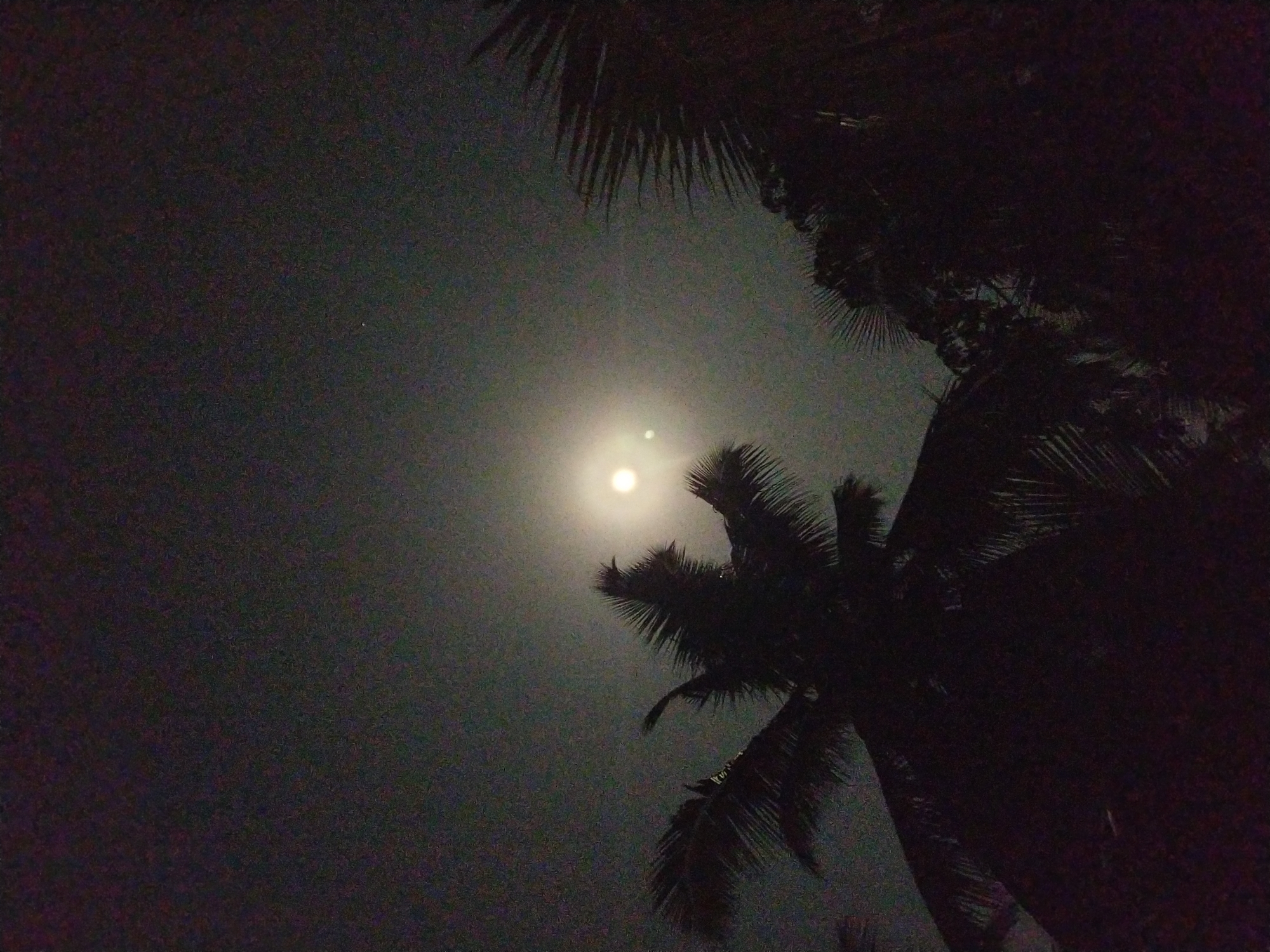 Evening moon and decorative lights documented in Badem, India